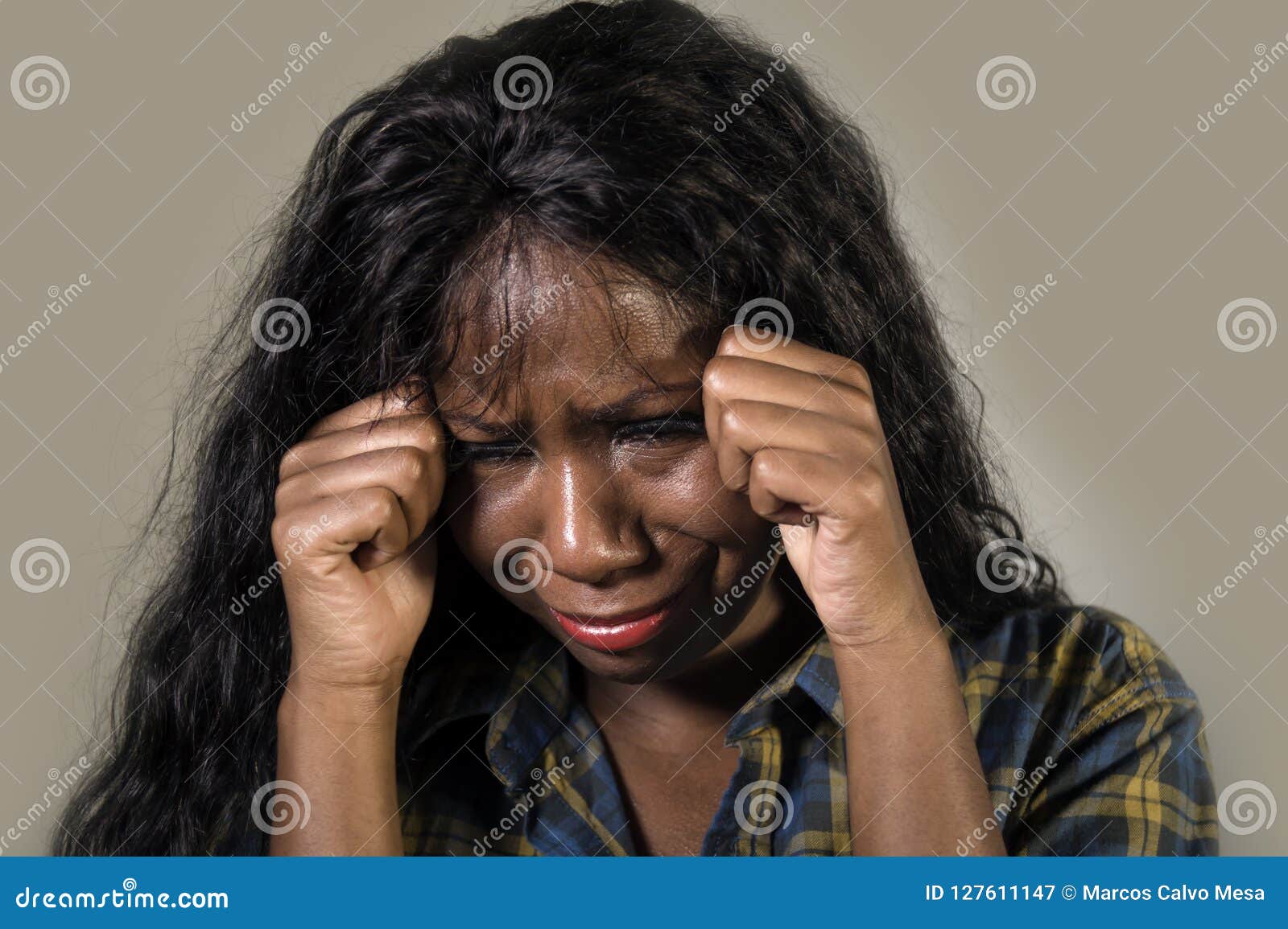 Young Sad And Depressed Black African American Woman Crying Anxious And Overwhelmed Feeling Sick 