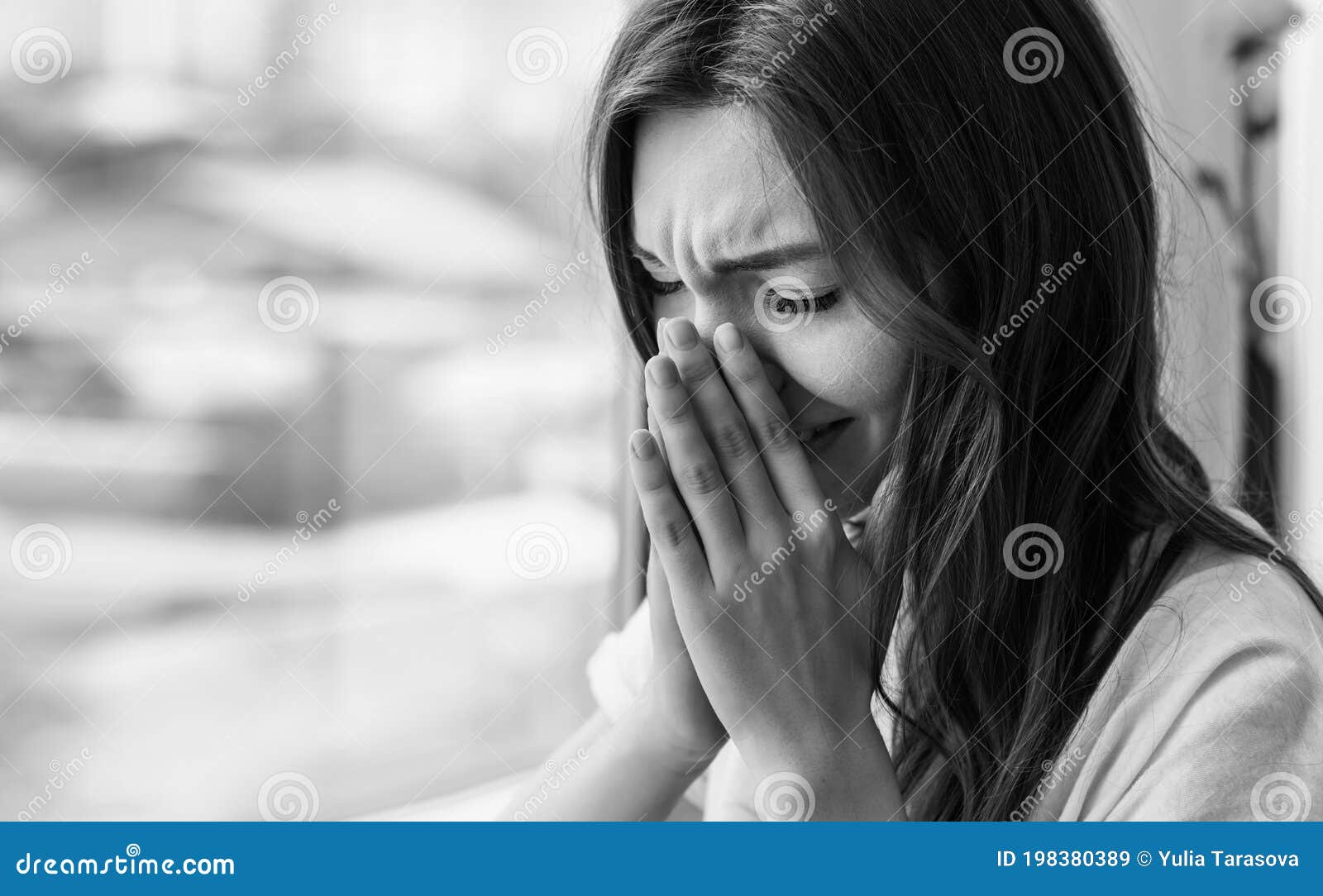 Young Sad Woman Sits Alone Front of the Window. Crying Girl Stock ...