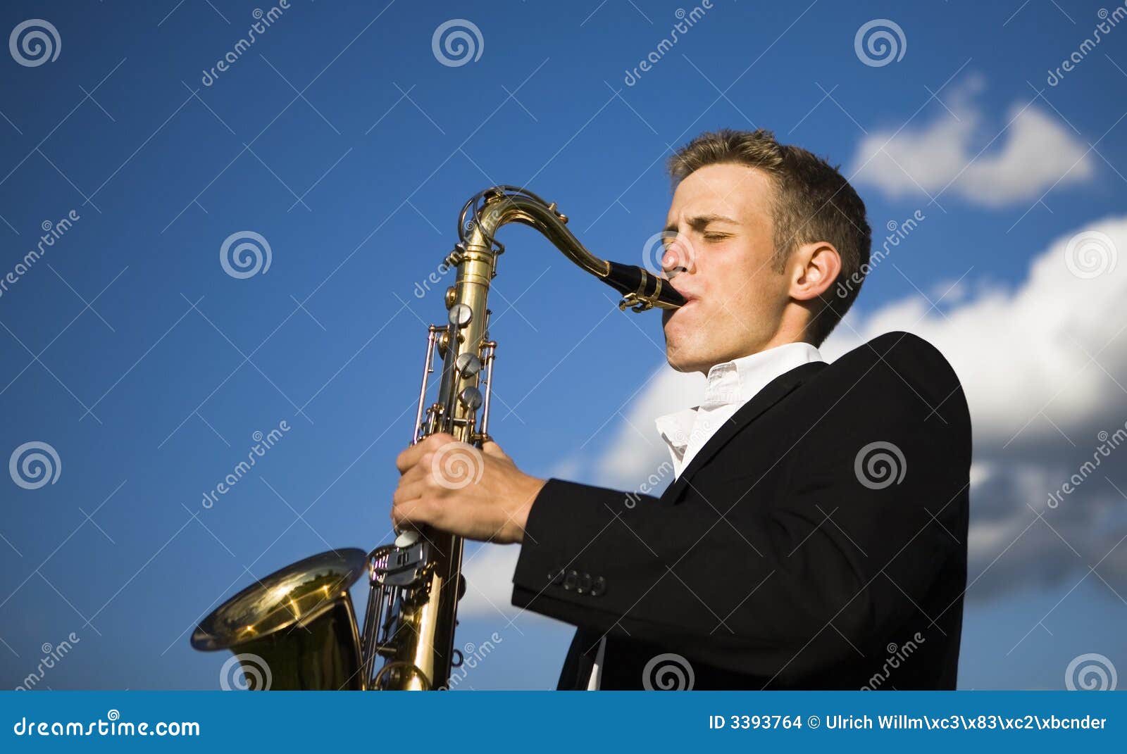 Young saxophone player stock photo. Image of instrument 3393764