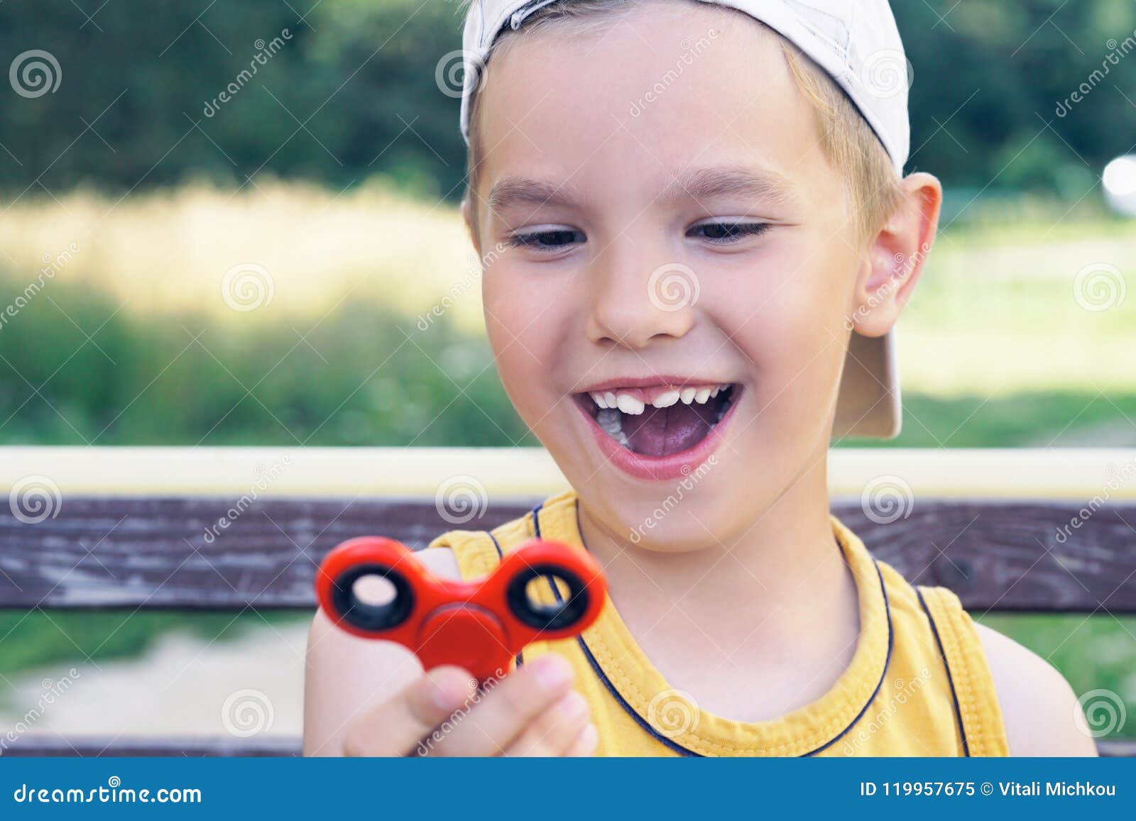 Young Schoolboy Holding Popular Fidget Spinner Toy Close Up Po