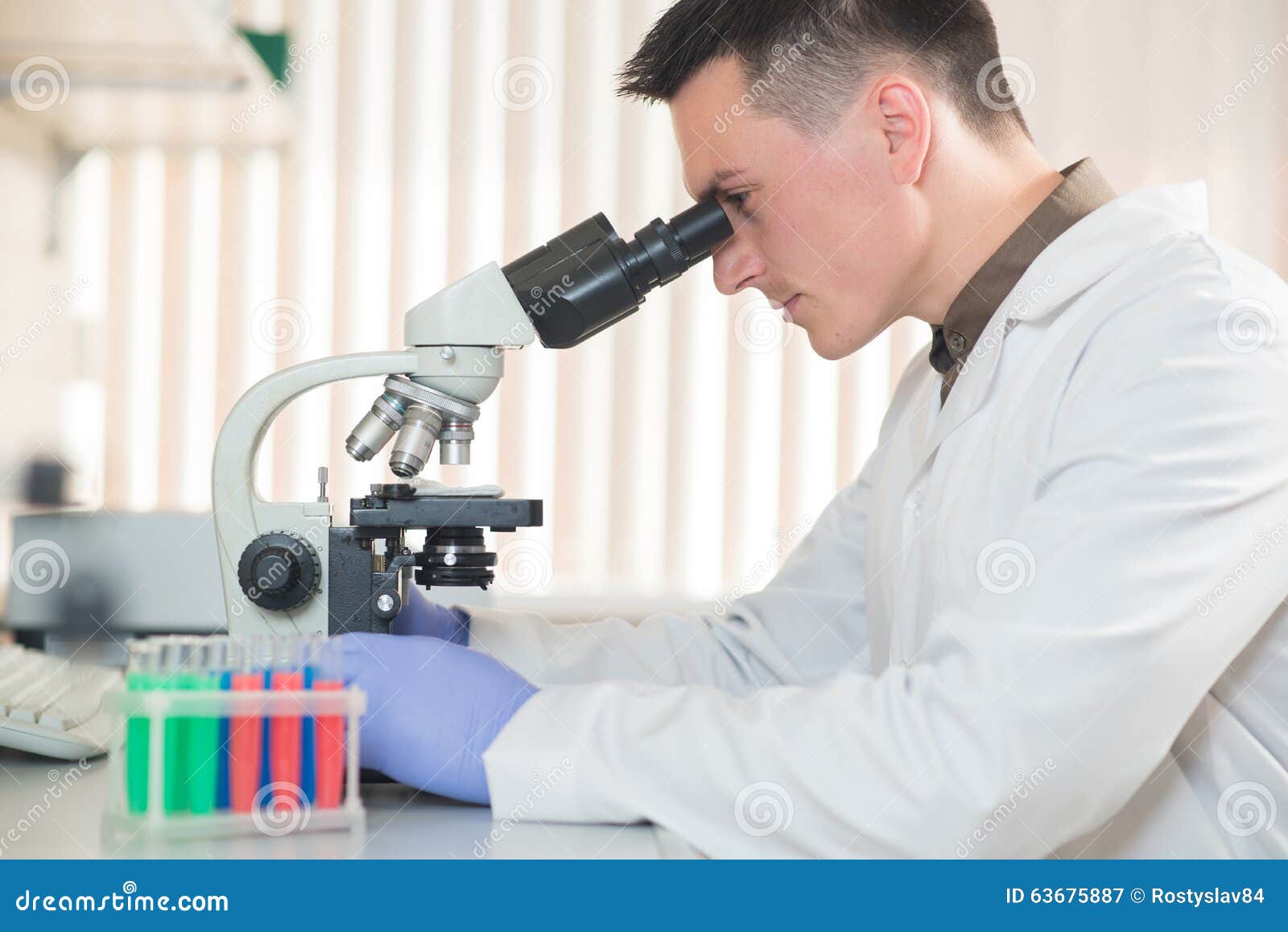 Young Scientist Working With A Microscope Stock Image Image Of
