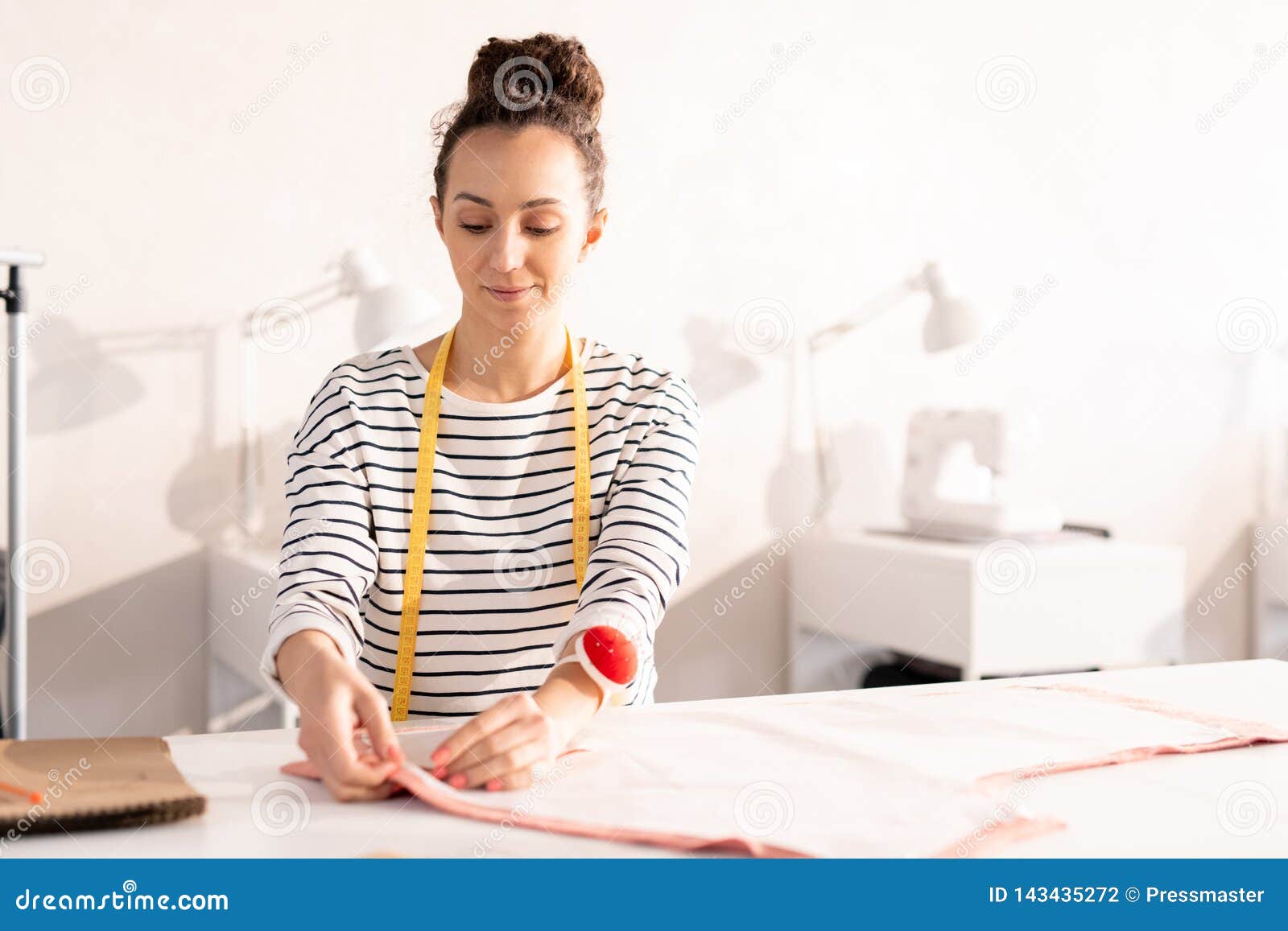 Young seamstress at work stock photo. Image of businesswoman - 143435272