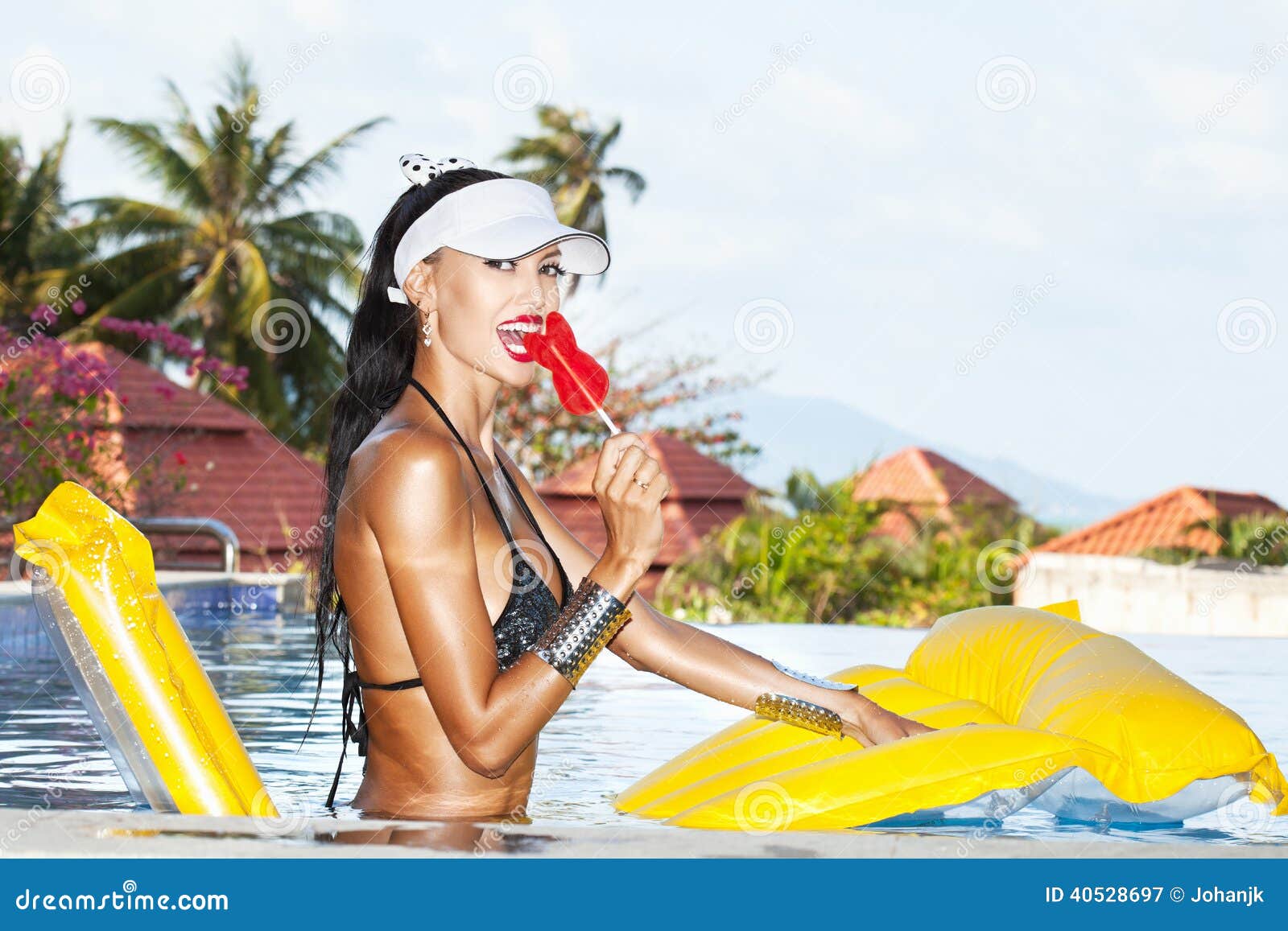 Young Sexual Woman Sucking Lollipop Stock Image photo