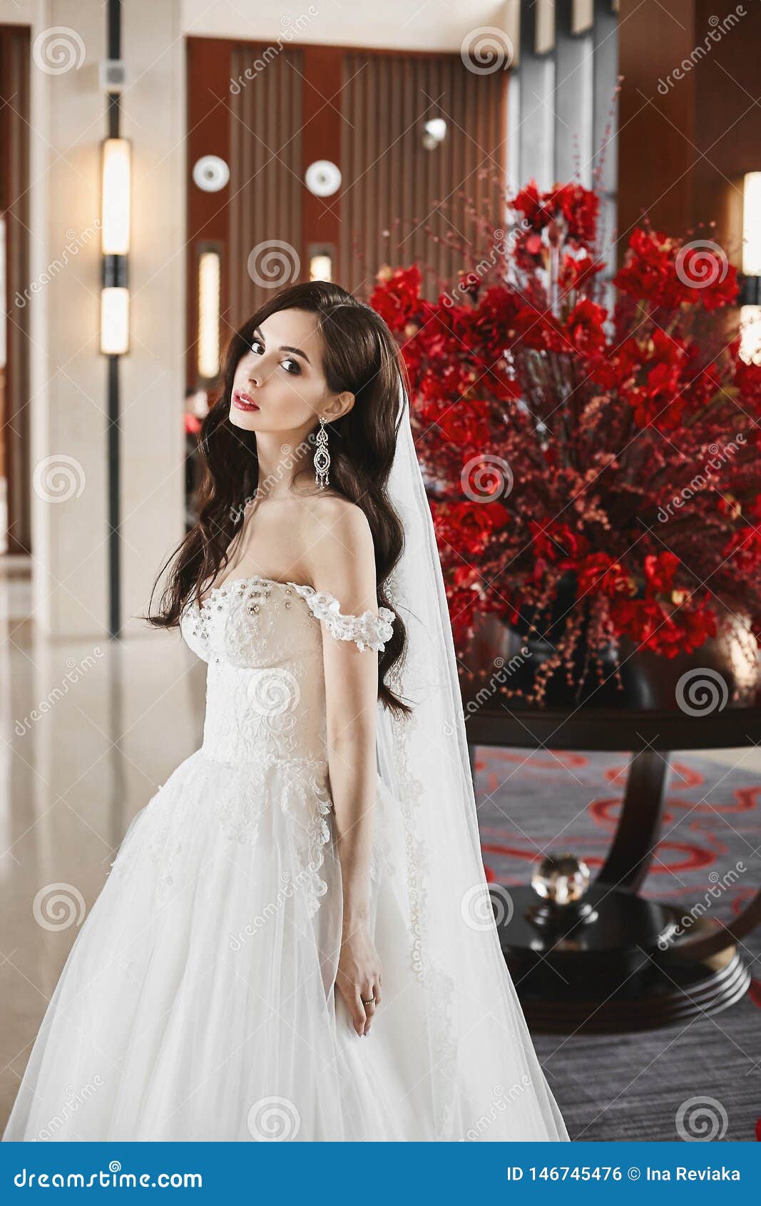 Beautiful, with a Large Bust, the Bride in a Wedding Dress Poses for the  Camera. Girl in White Dress Stock Image - Image of girl, elegant: 270787999