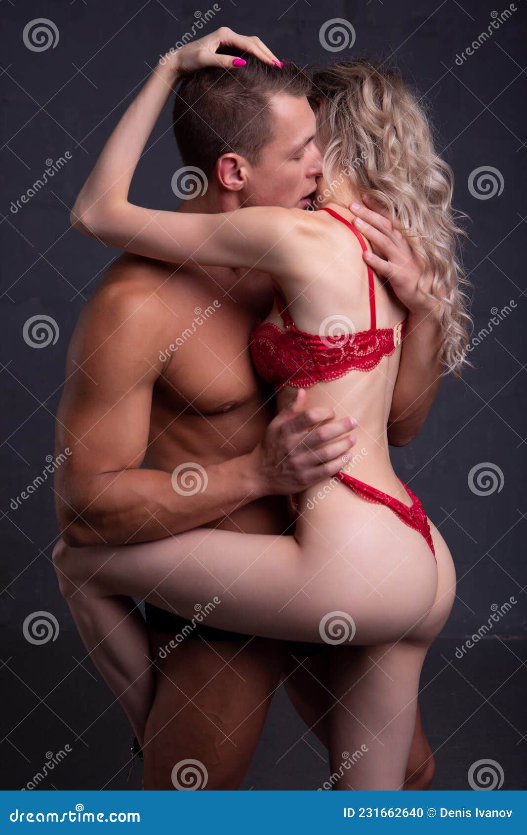 A Young Couple of Lovers in Underwear Passionately Embracing on a Black  Background. Stock Photo - Image of couple, boyfriend: 231662640