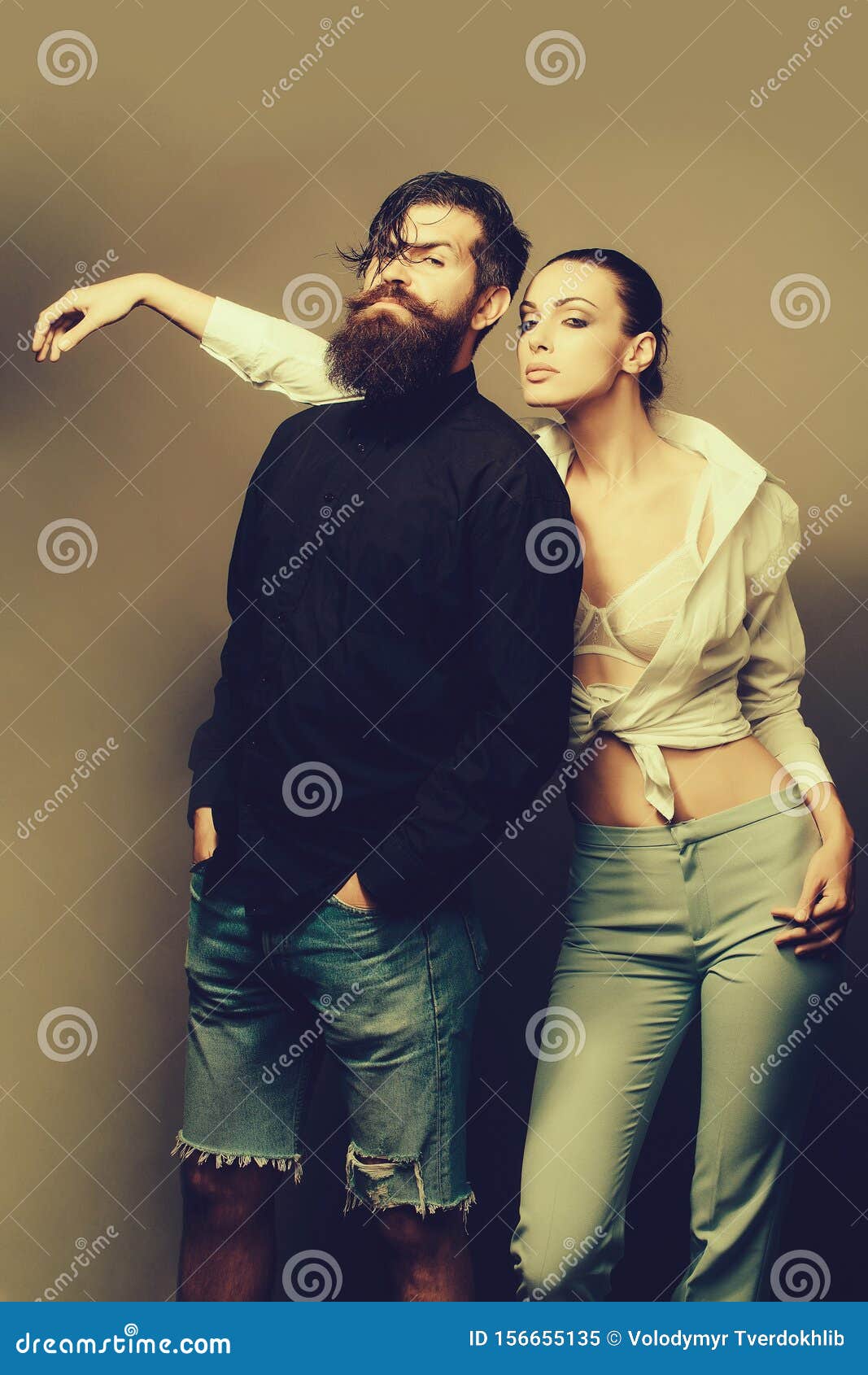 Young Stylish Couple in Studio Stock Image - Image of jeans ...
