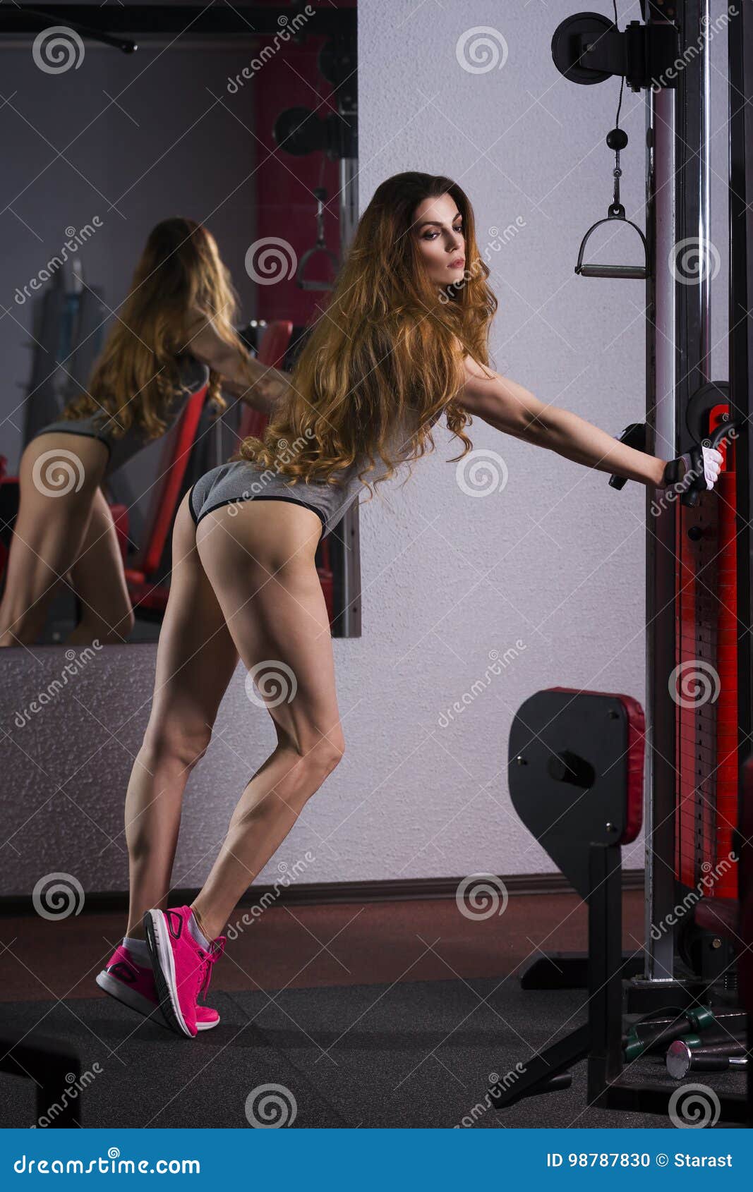 Young Fitness Girl Workout with Trainer in the Gym, Woman with Perfect  Muscular Body Stock Photo - Image of loss, legs: 98787830