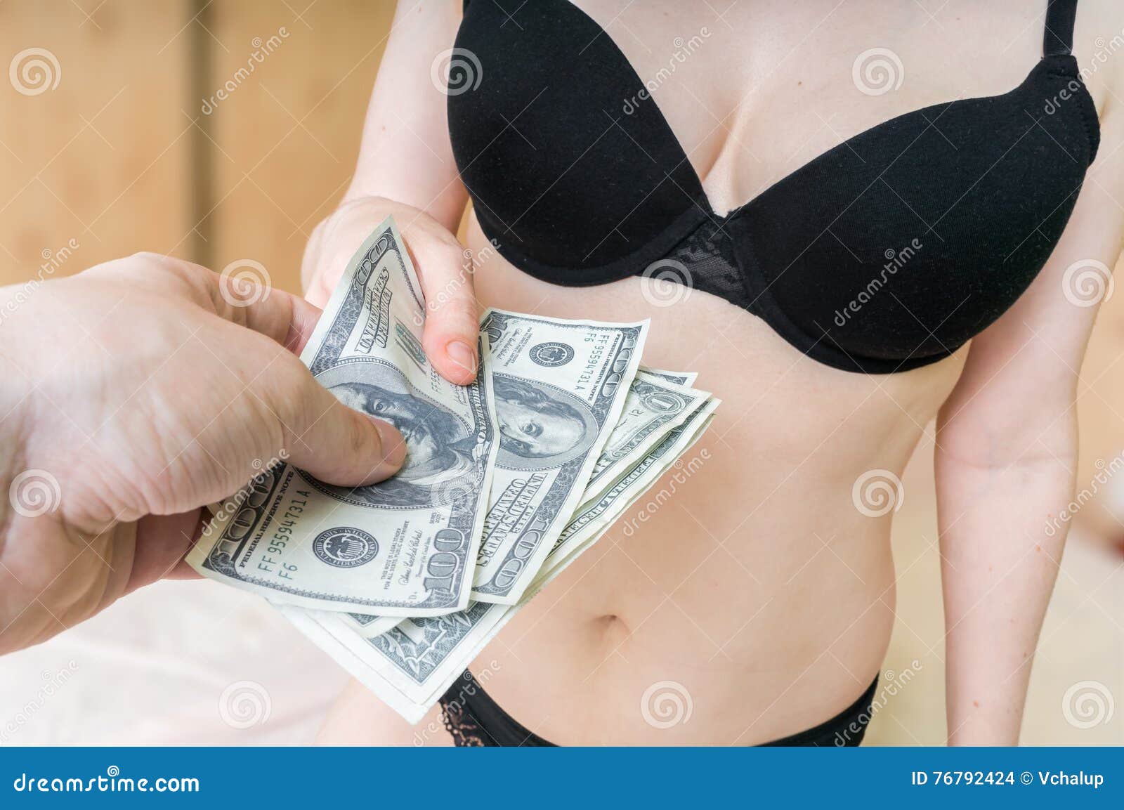 Young Prostitute is Taking Money for Sex Stock Photo picture
