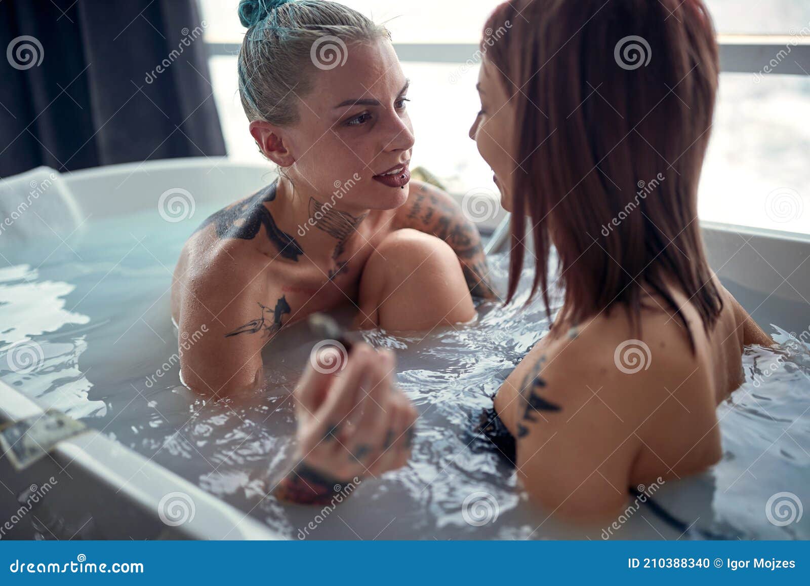 A communal lesbian bath!