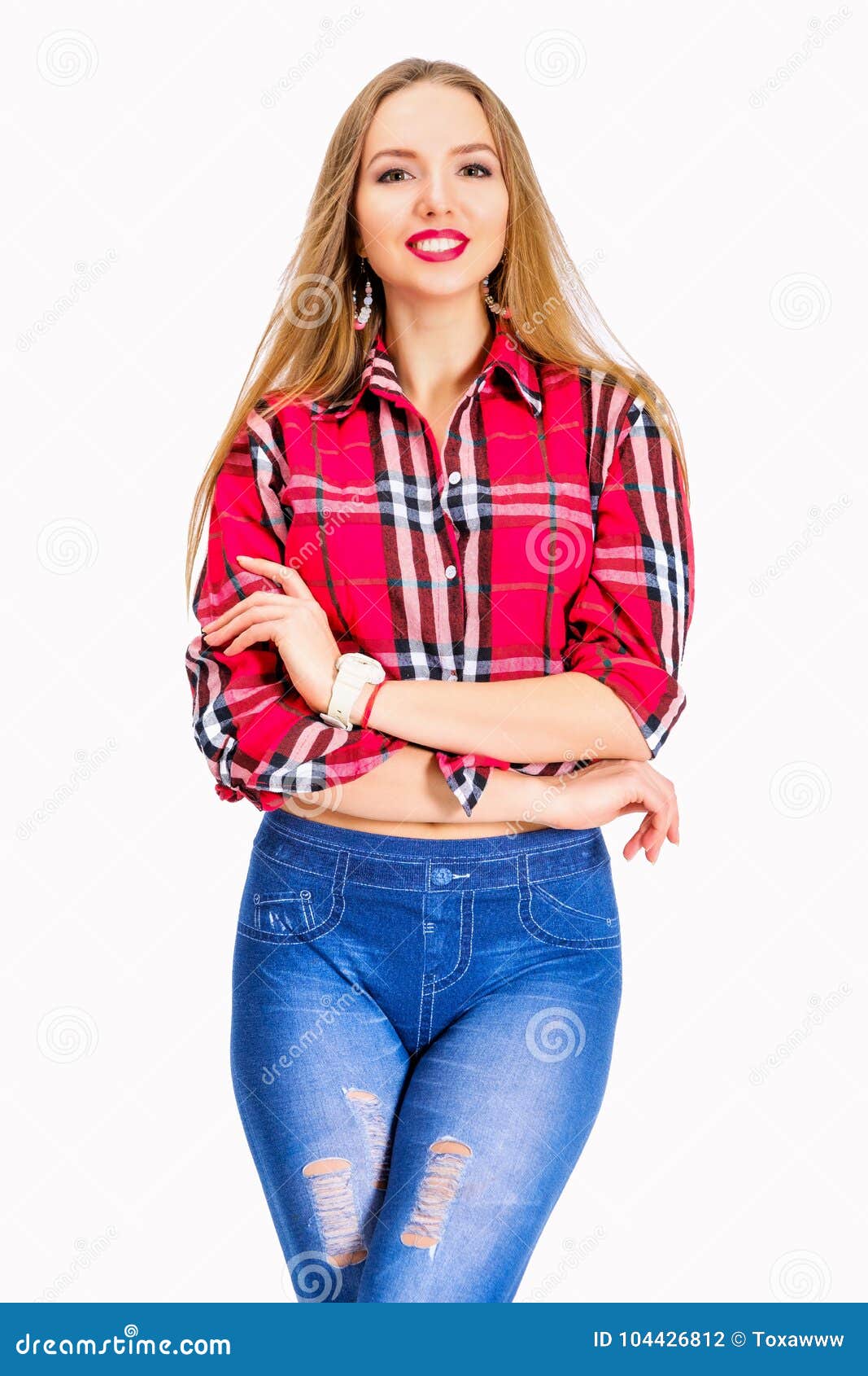 Young Woman Dressed in Jeans and Checkered Shirt Posing in Studio Stock ...