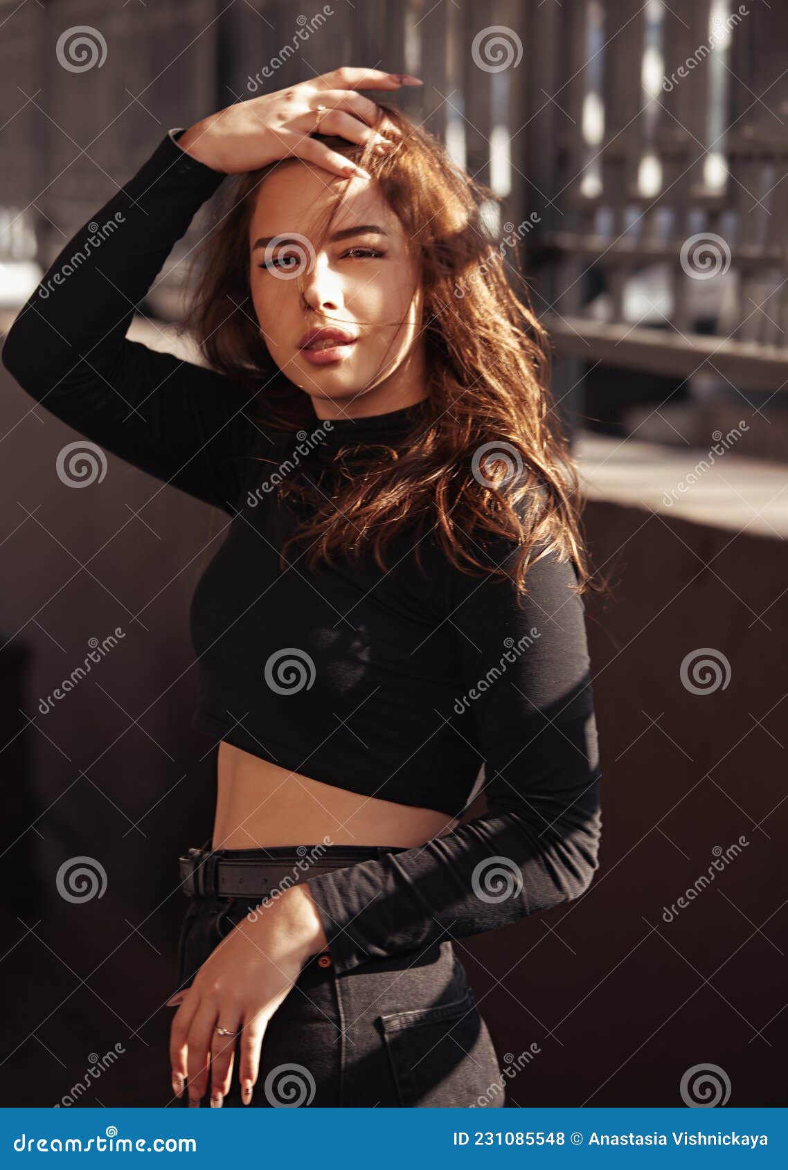 Young Woman Looking and Walking on the Street in Black Style Clothing with  Naked Belly. Autumn Season Clothing Stock Photo - Image of adult, beauty:  231085548