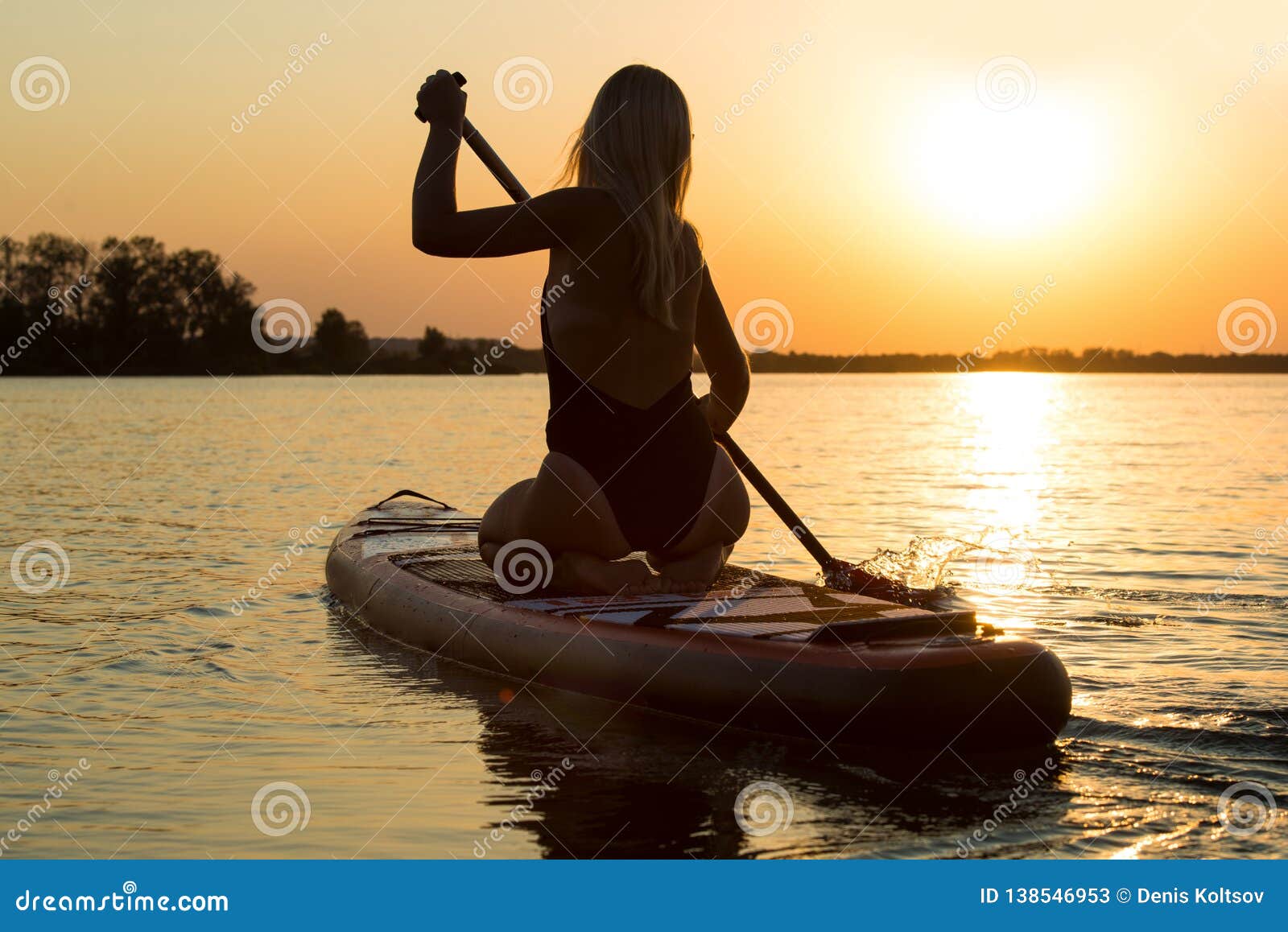 Young Woman Swimming on Stand Up Paddle Board.Water Sports , Active ...