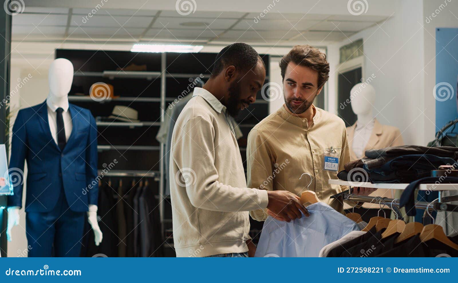 Young Shopper Asking Shop Worker for Help with Clothes Stock Image ...