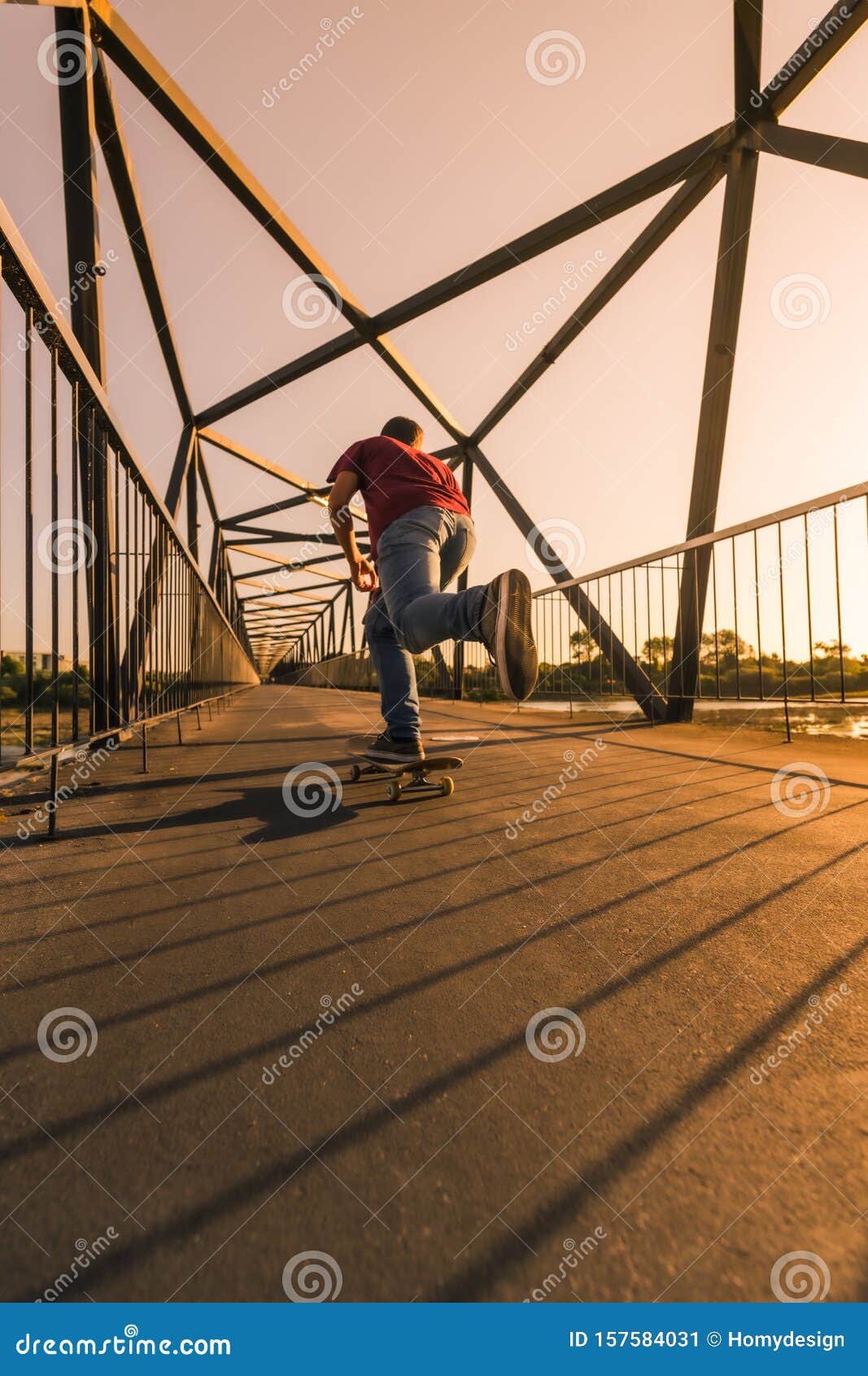 Young Skateboarder on Bridge at Sunset Stock Image Image of