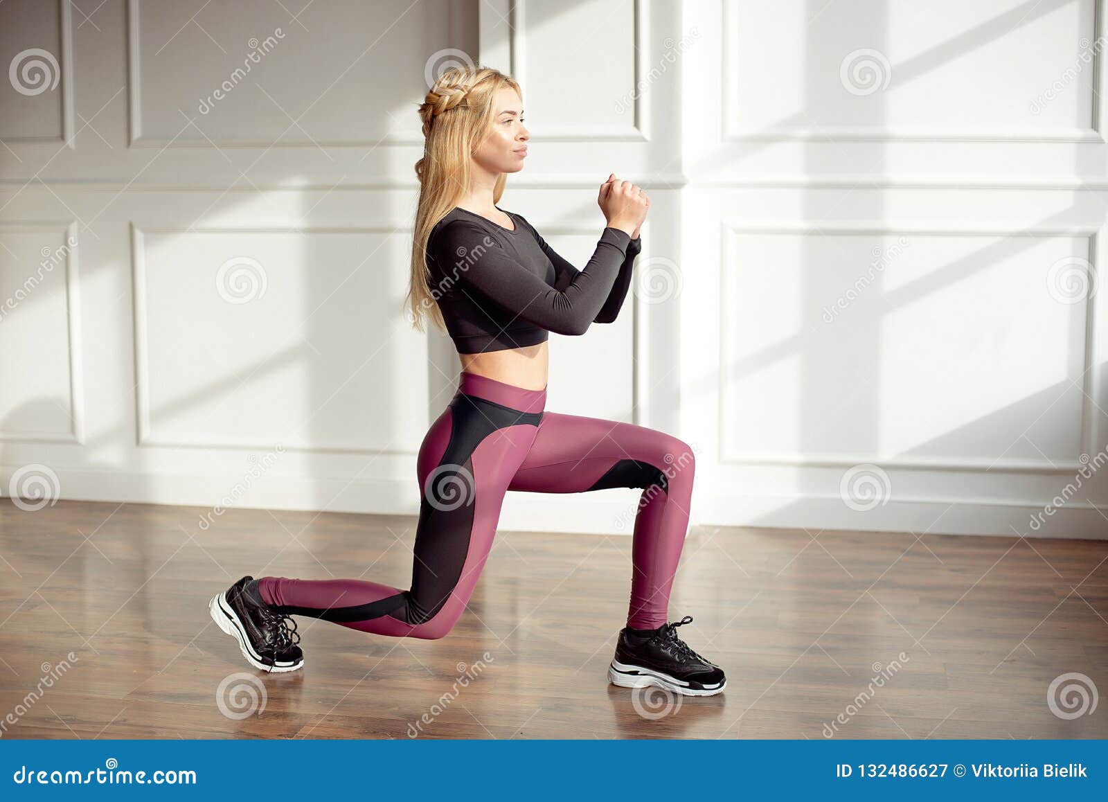 Young Slim Woman with an Athletic Body Long Blonde Hair, Wearing a