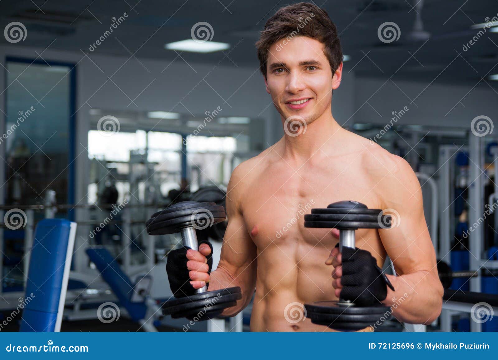 Young Smiling Athlete Lifting Weights in the Gym Stock Photo Image of