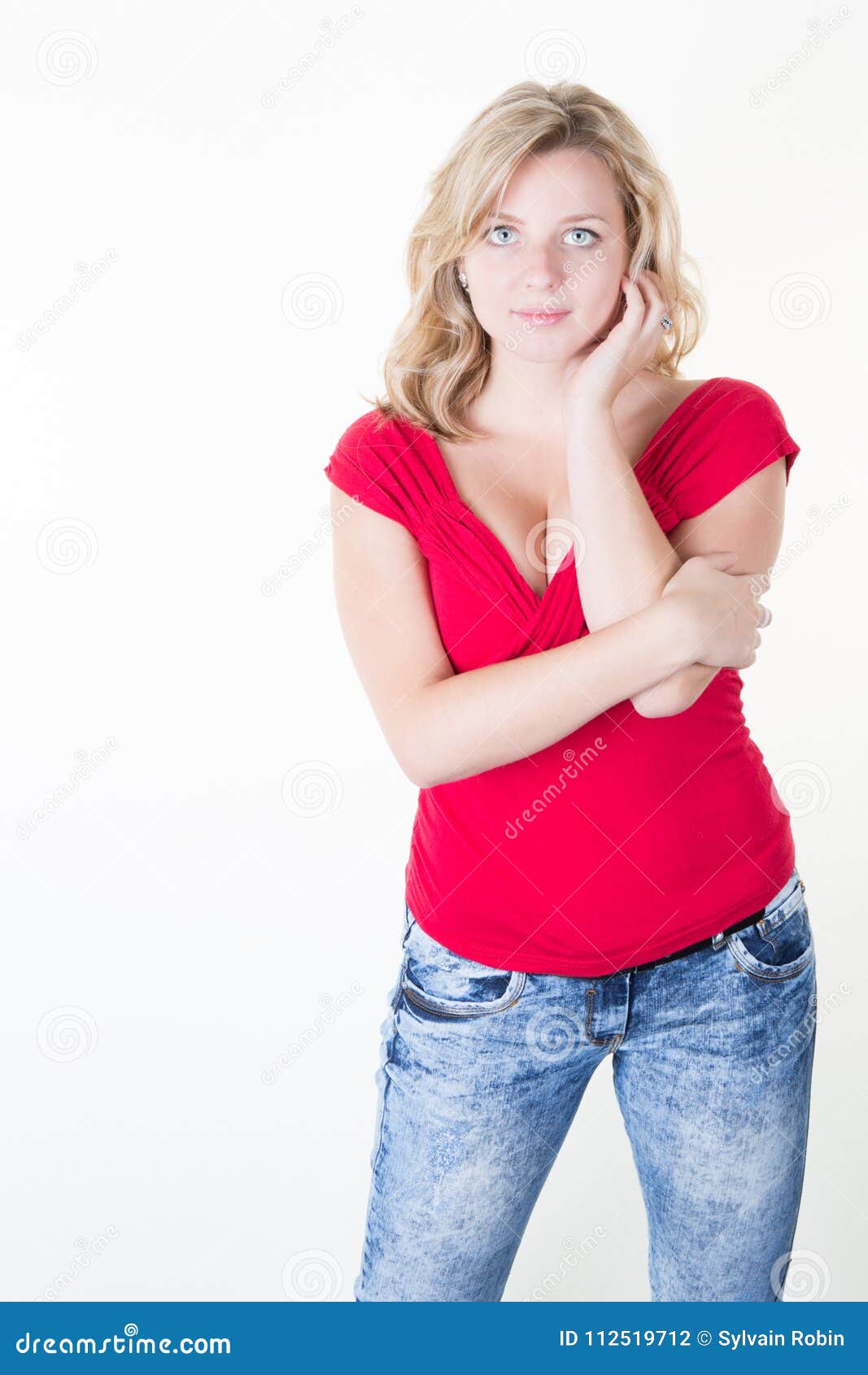 Young Smiling Female Standing With Folded Hands Stock Photo - Image of ...