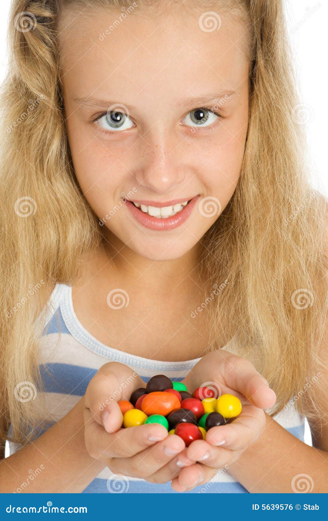 Young Smiling Girl with Chocolate Candy Stock Photo Image of face