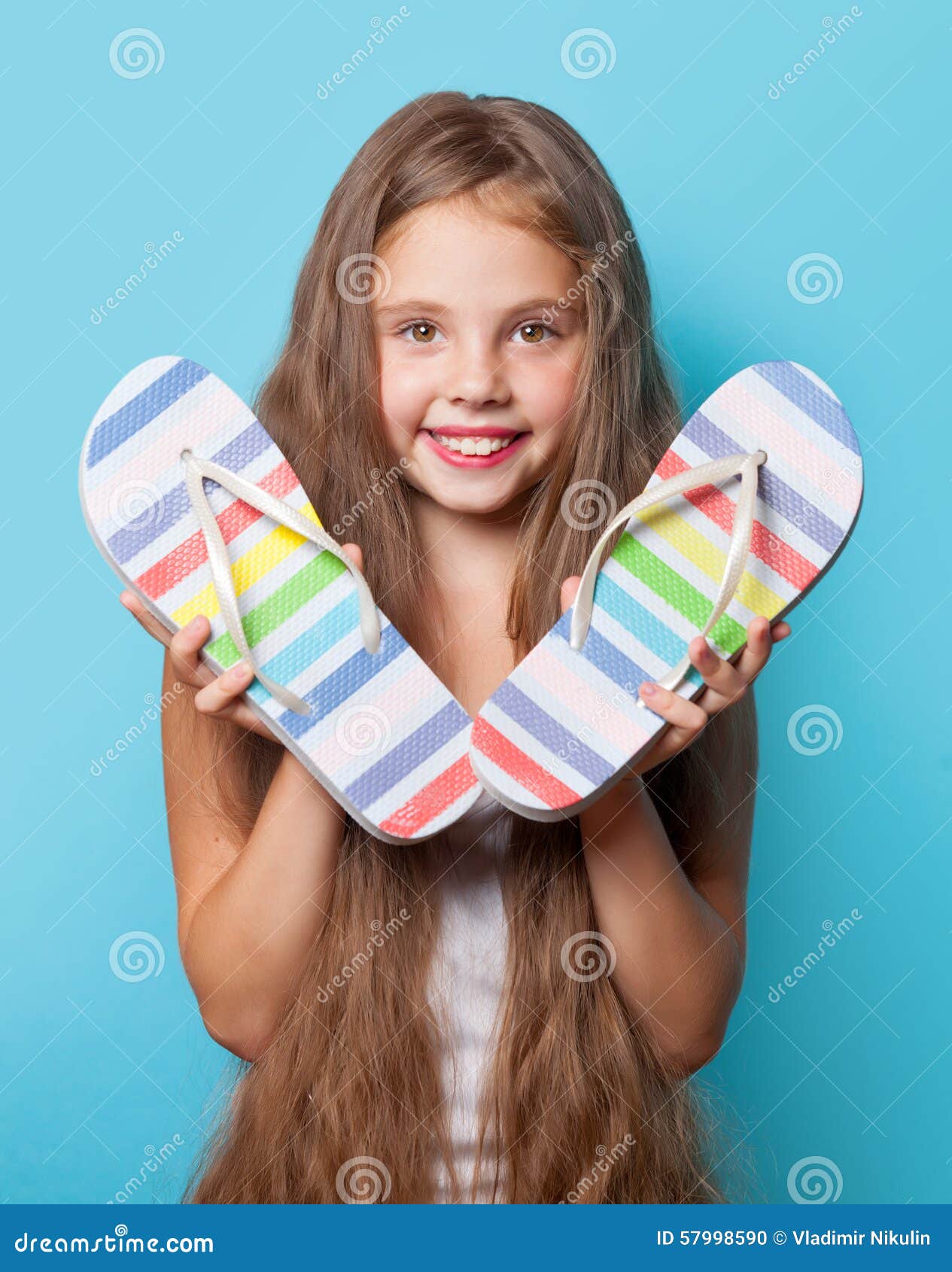 Young Smiling Girl with Flip Flops Stock Photo - Image of little ...