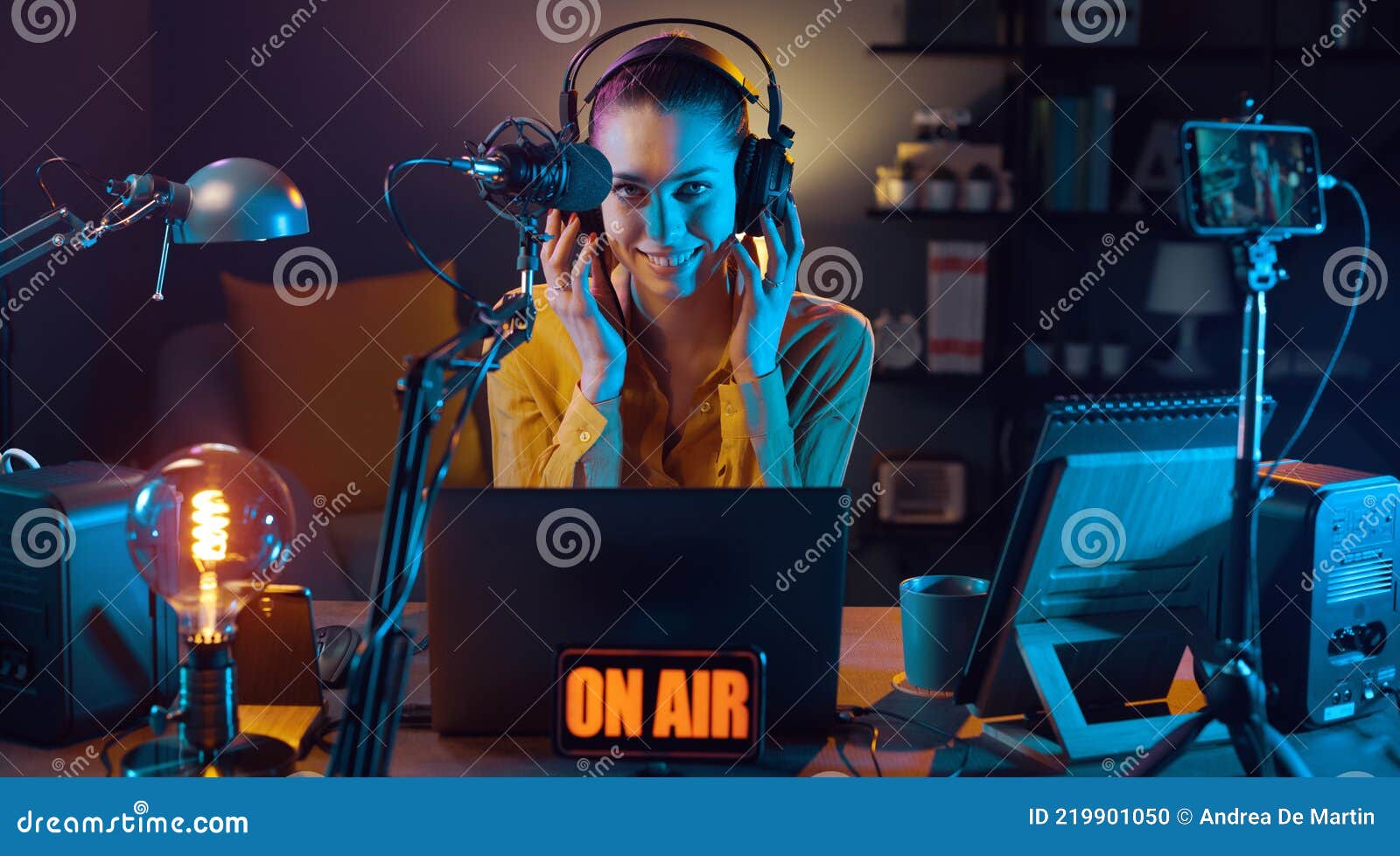 Young Radio Host Broadcasting at the Radio Station Stock Photo Image