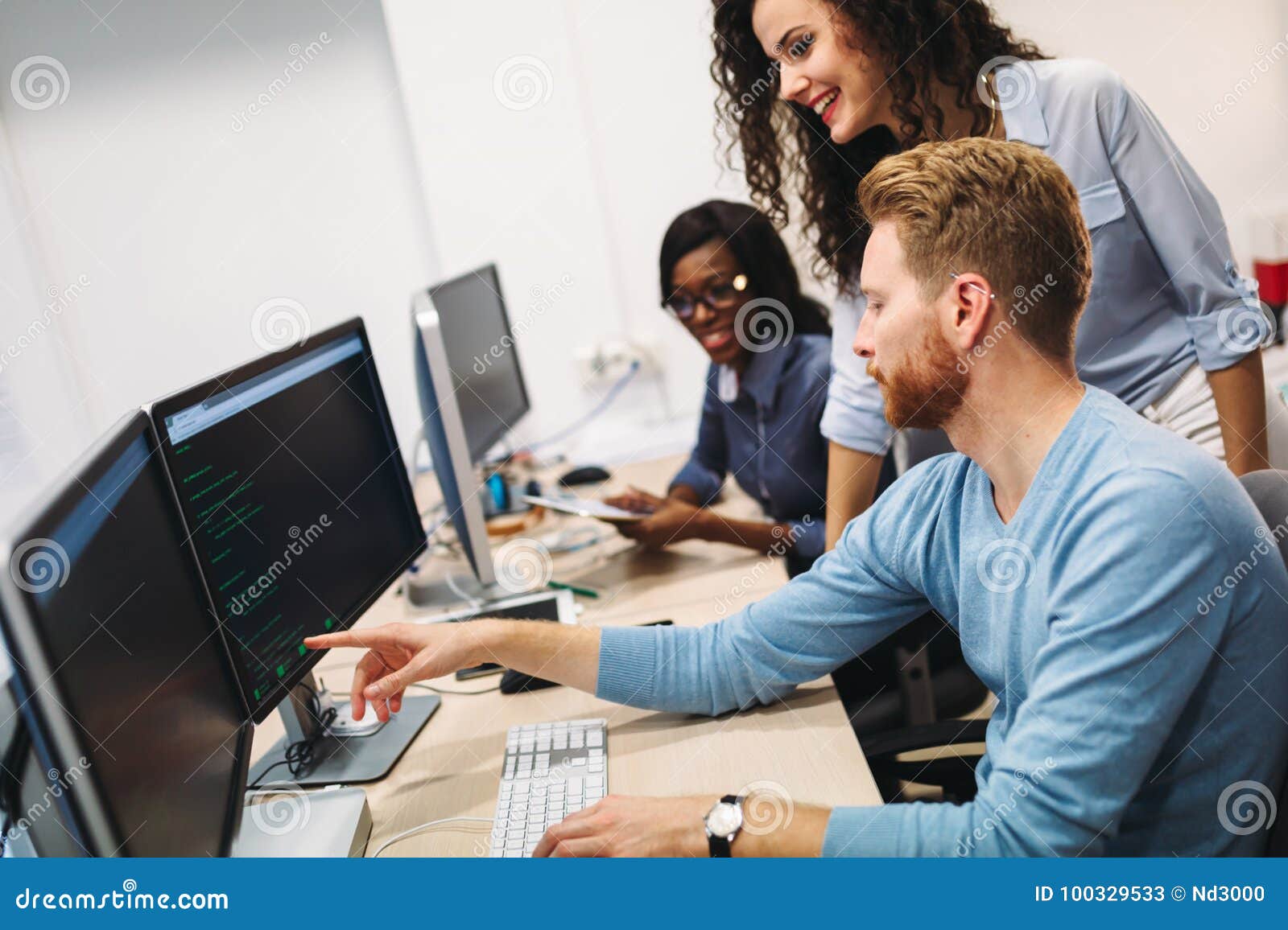 Software Engineers Working on Project and Programming in Company Stock