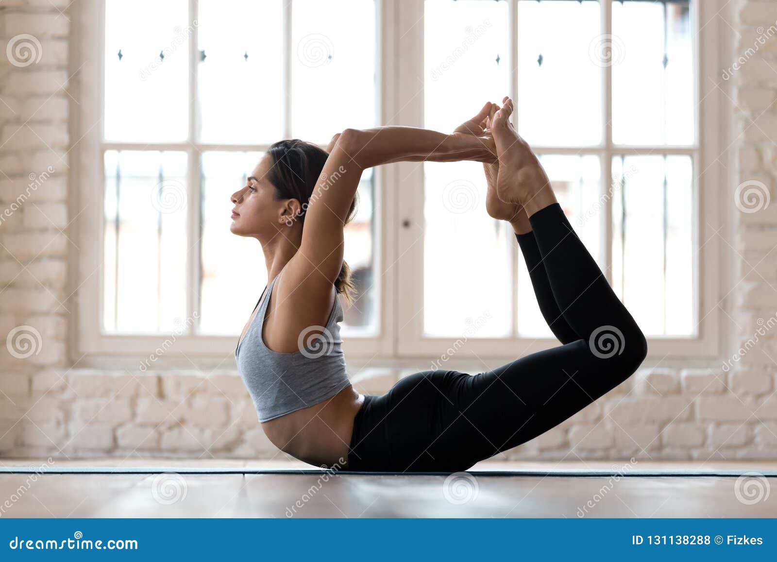 Young Sporty Attractive Woman Practicing Yoga, Doing 