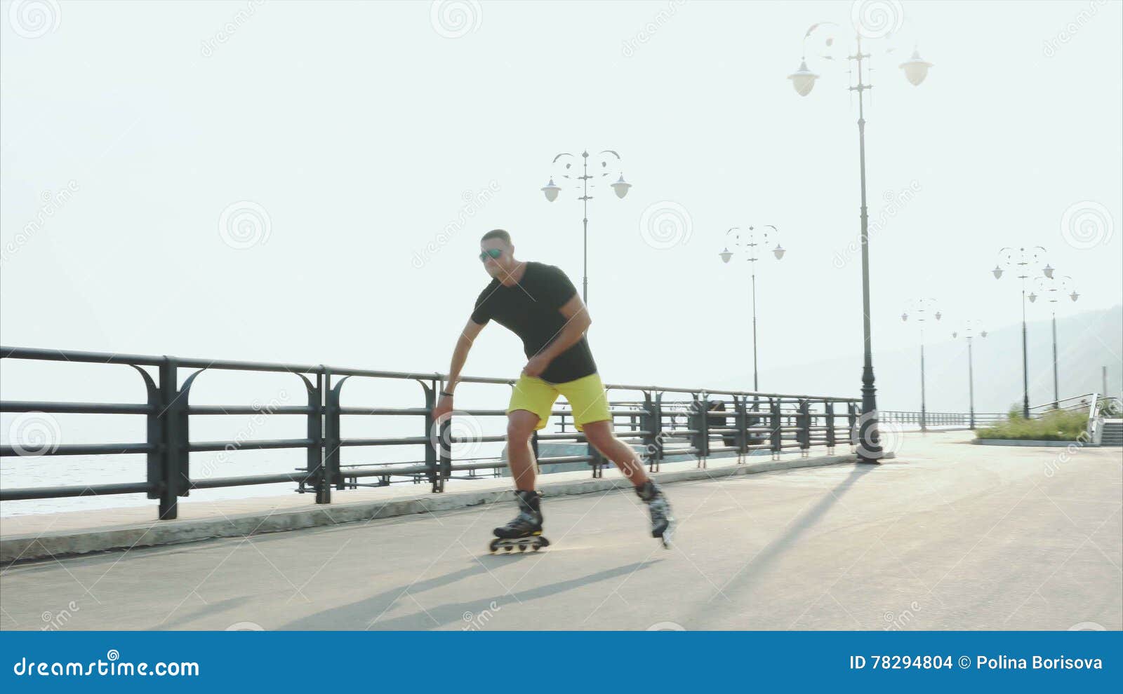 Young Sporty Man Roller Skating on Summer Waterfront Stock Footage