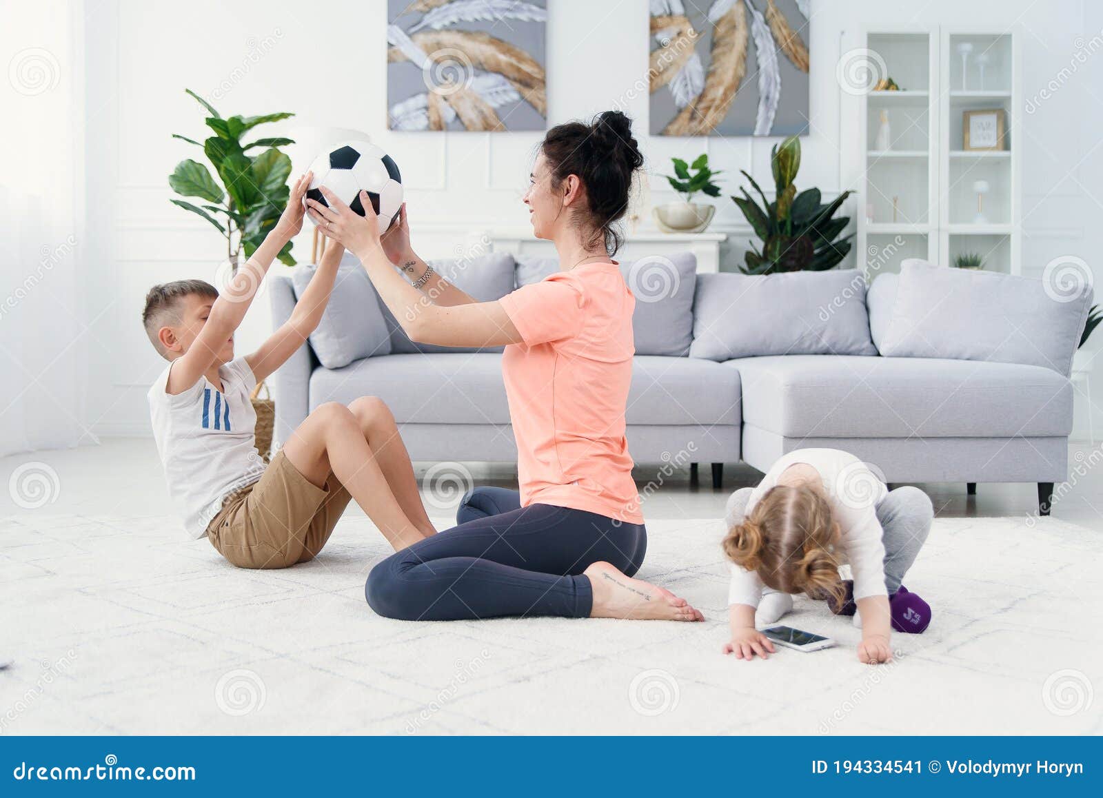 Young Sporty Mom With Son Doing Morning Work Out Exercises At Home Healthy Family Lifestyle Concept Stock Image Image Of Relaxing Exercise