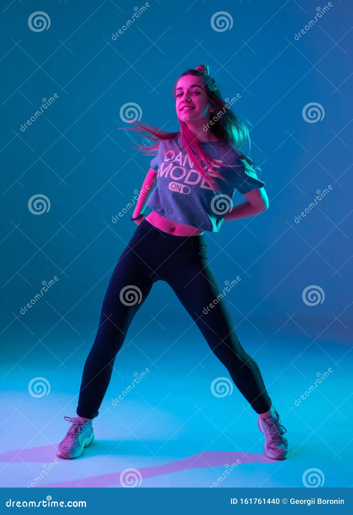 Young Stylish Girl Dancing Zumba in the Studio on a Colored Neon Background.  Dance Poster Design Stock Photo - Image of backlit, dancing: 161761440