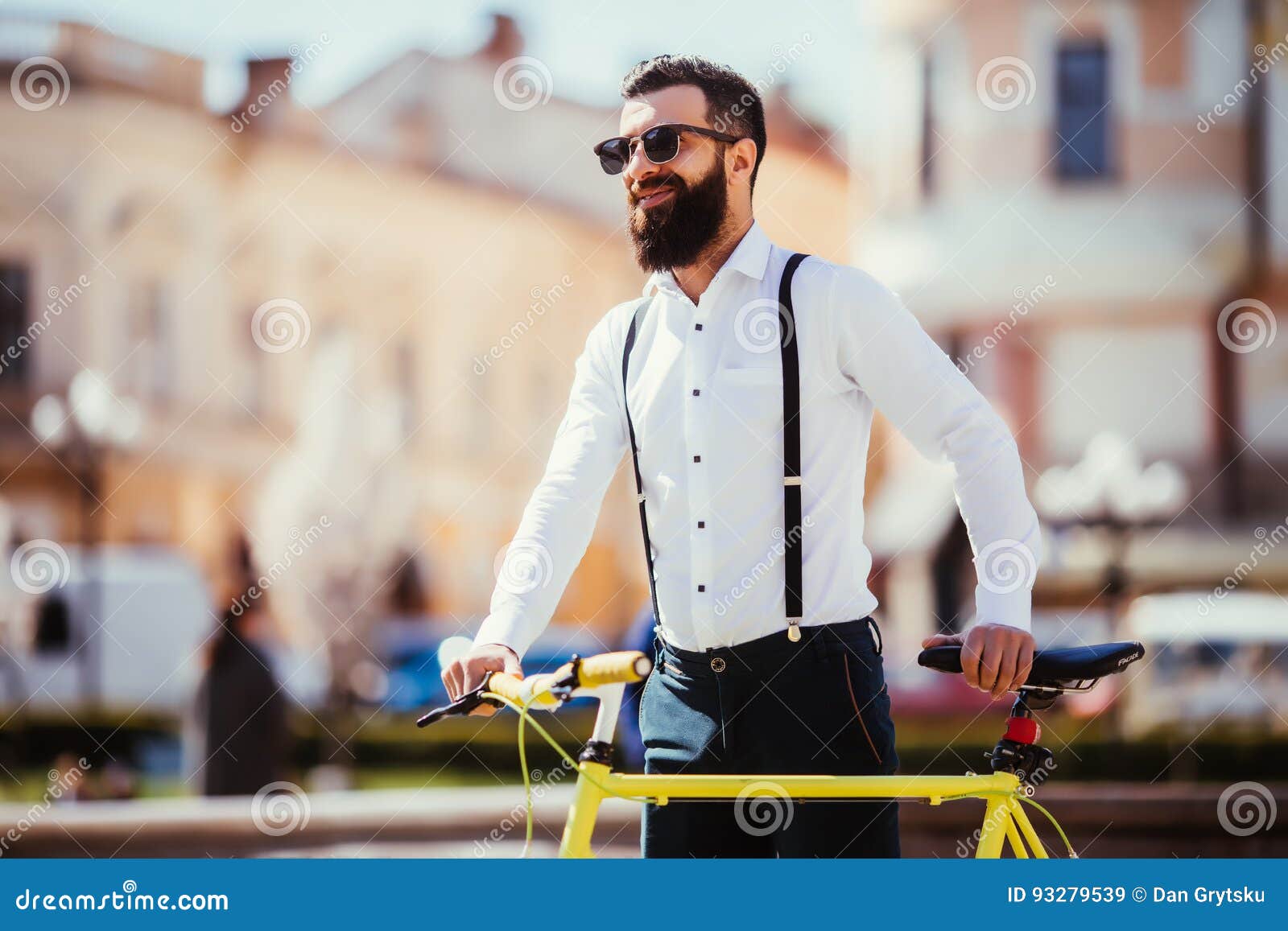 Young hipster businessman going to work on bike. Eco friendly