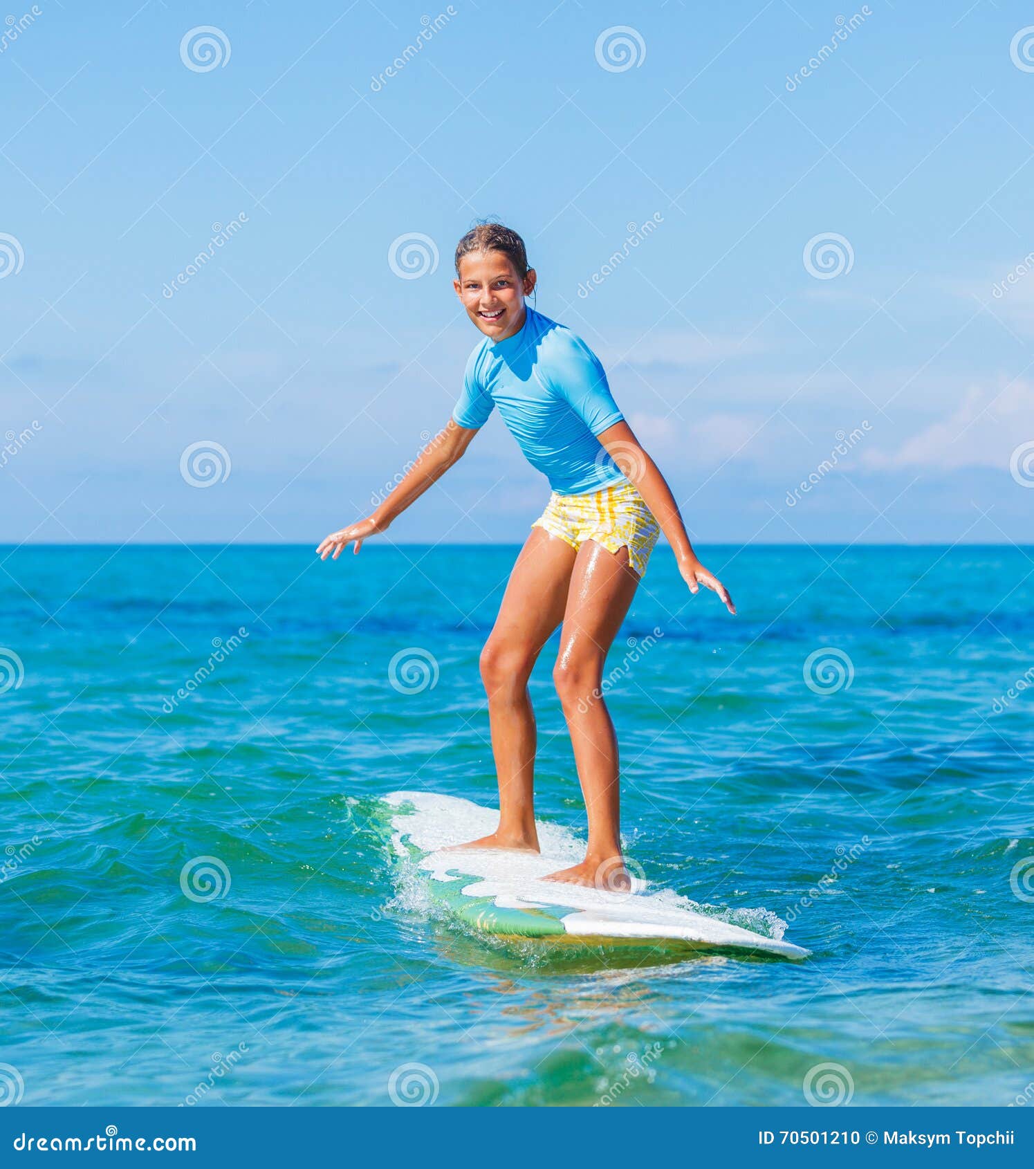 Young surfer girl stock photo. Image of sports, girl - 70501210