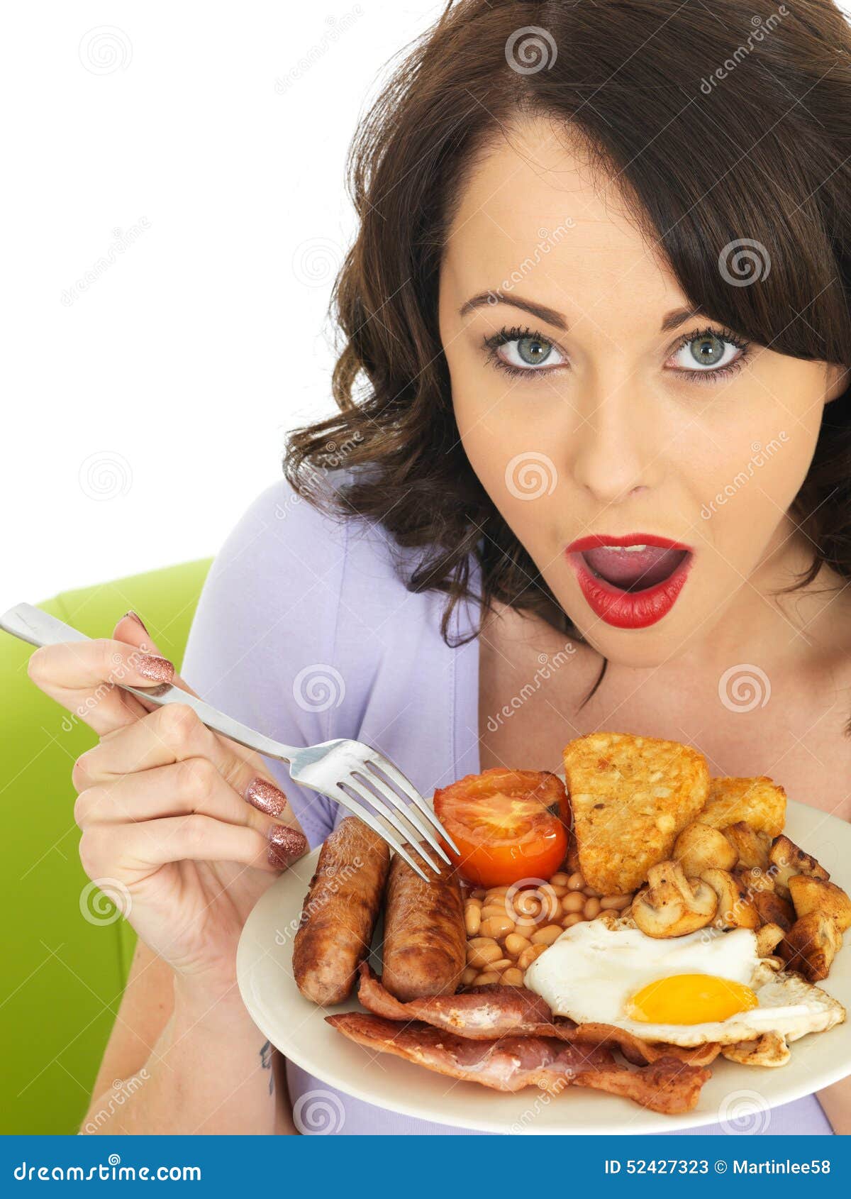 Young Surprised Woman Holding a Plate of <b>Full English</b> Breakfast - young-surprised-woman-holding-plate-full-english-breakfast-dslr-royalty-free-image-two-sausages-two-hash-browns-two-52427323