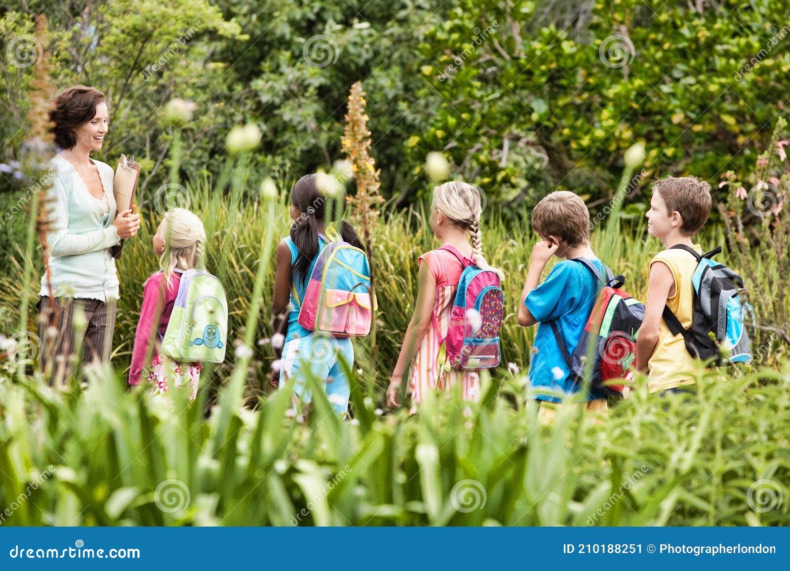 Young Teacher with Children on Nature Field Trip Stock Image Image of