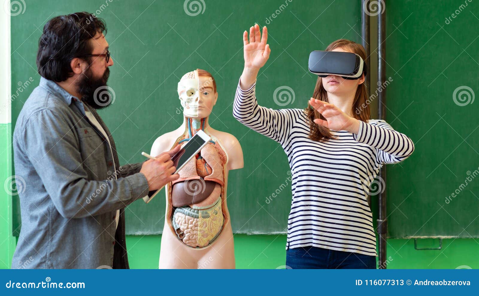 young teacher using virtual reality glasses and 3d presentation. education, vr, tutoring, new technologies and teaching methods.