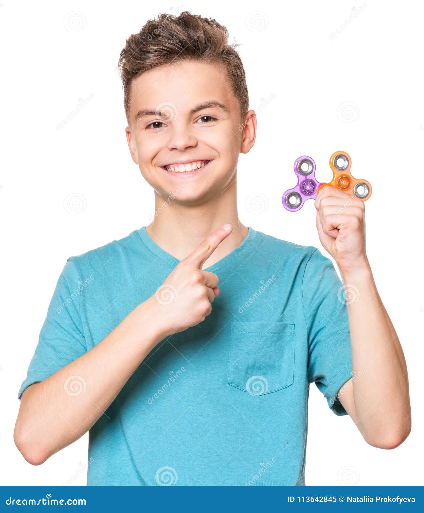 Teen boy with spinner toy stock image