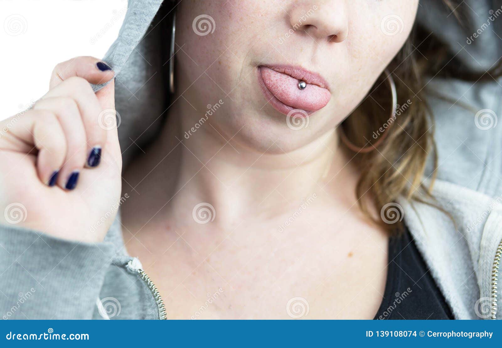 Young Teen Girl With Tongue Piercing And Hoodie Stock Photo Image Of