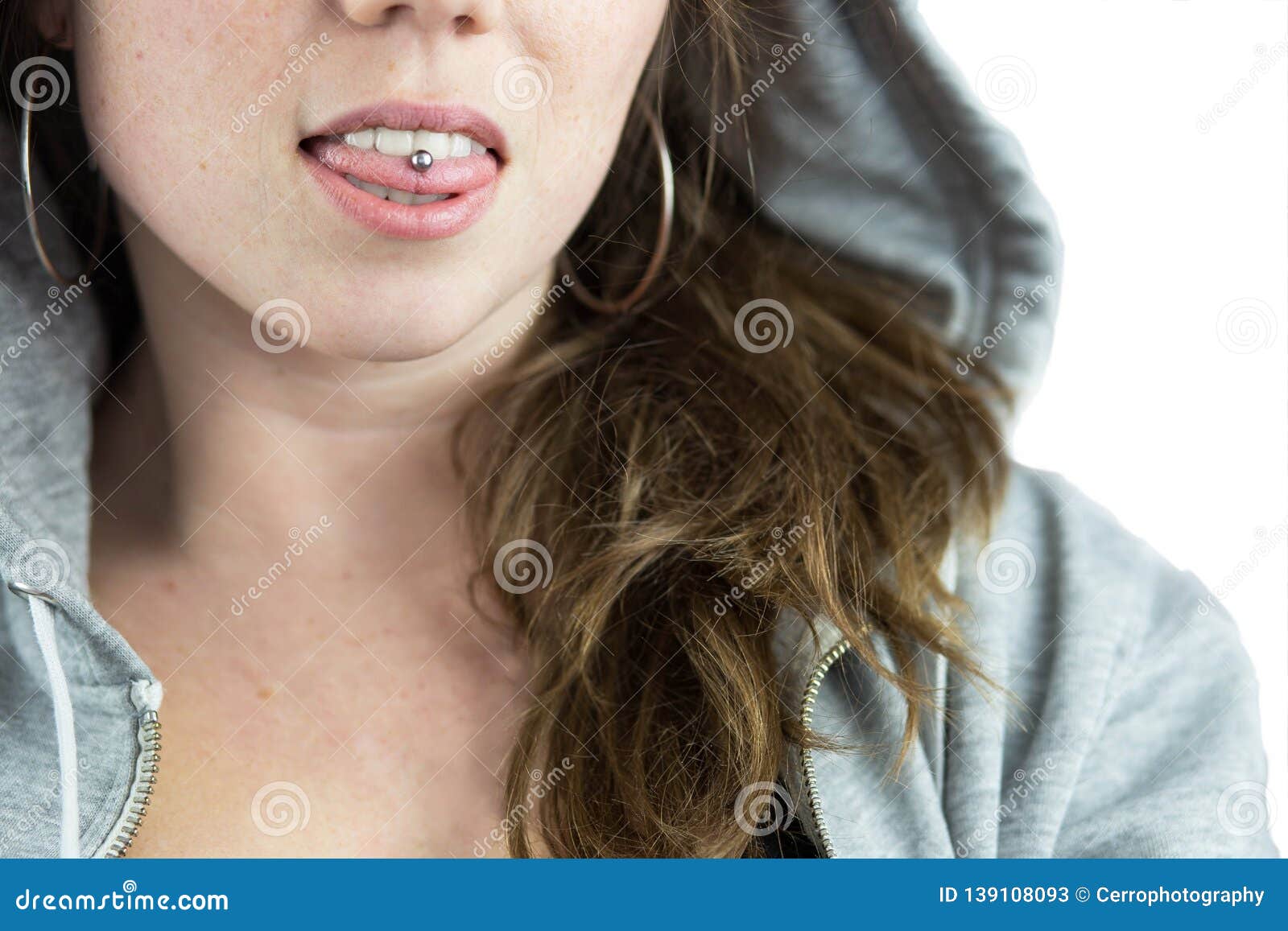 Young Teen Girl With Tongue Piercing And Hoodie Stock Image Image Of