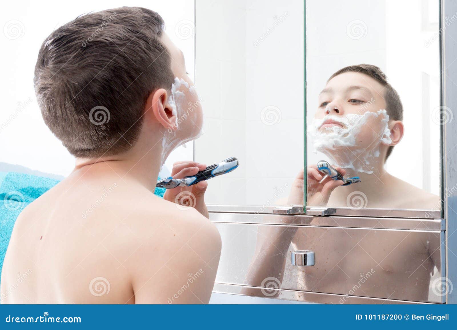Boy in a bathroom stock photo image Boy in a bathroom stock photo pic