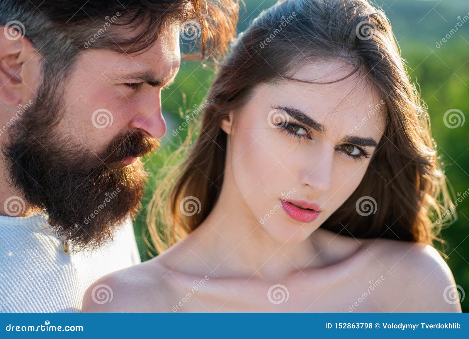 Young Tender Lover Enjoys Touching Soft Skin of Sensual Lady photo