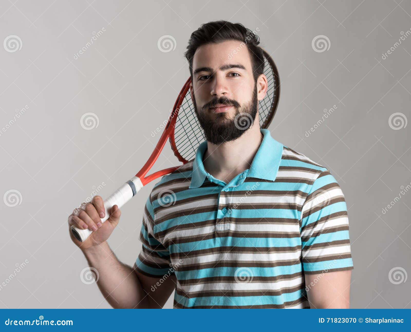 Young Tennis Player in Polo Shirt Holding Racket Stock Photo - Image of ...