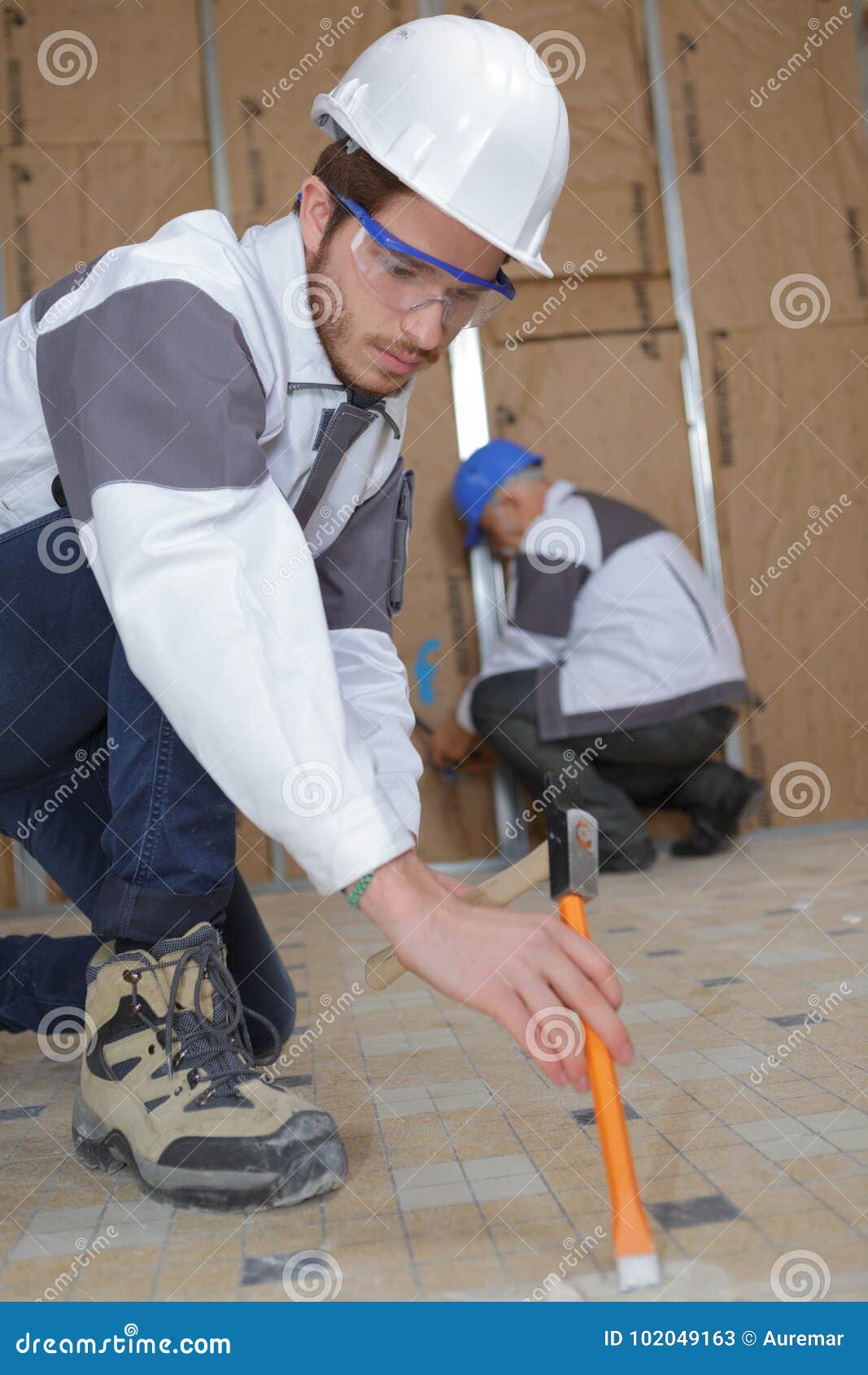 Young Tile Installer Removing Old Tiling Stock Image Image of