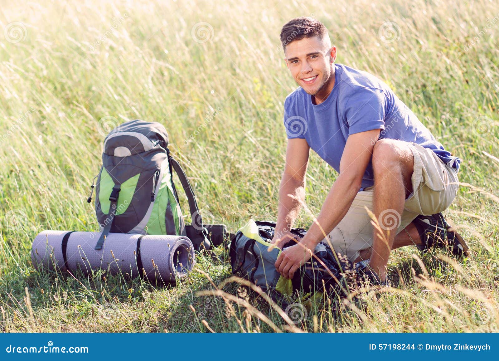 Young tourist in the field stock photo. Image of camp - 57198244