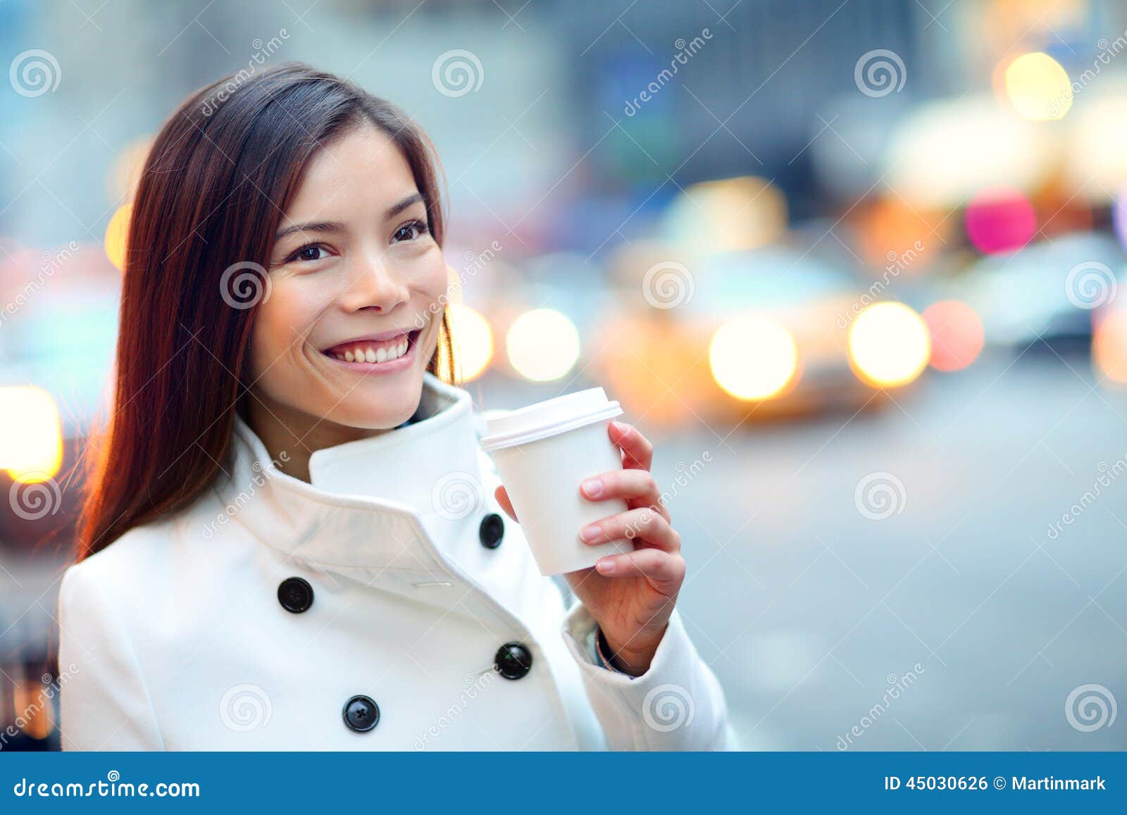 young-urban-professional-business-woman-new-york-casual-city-manhattan-drinking-coffee-walking-street-wearing-coat-downtown-45030626.jpg