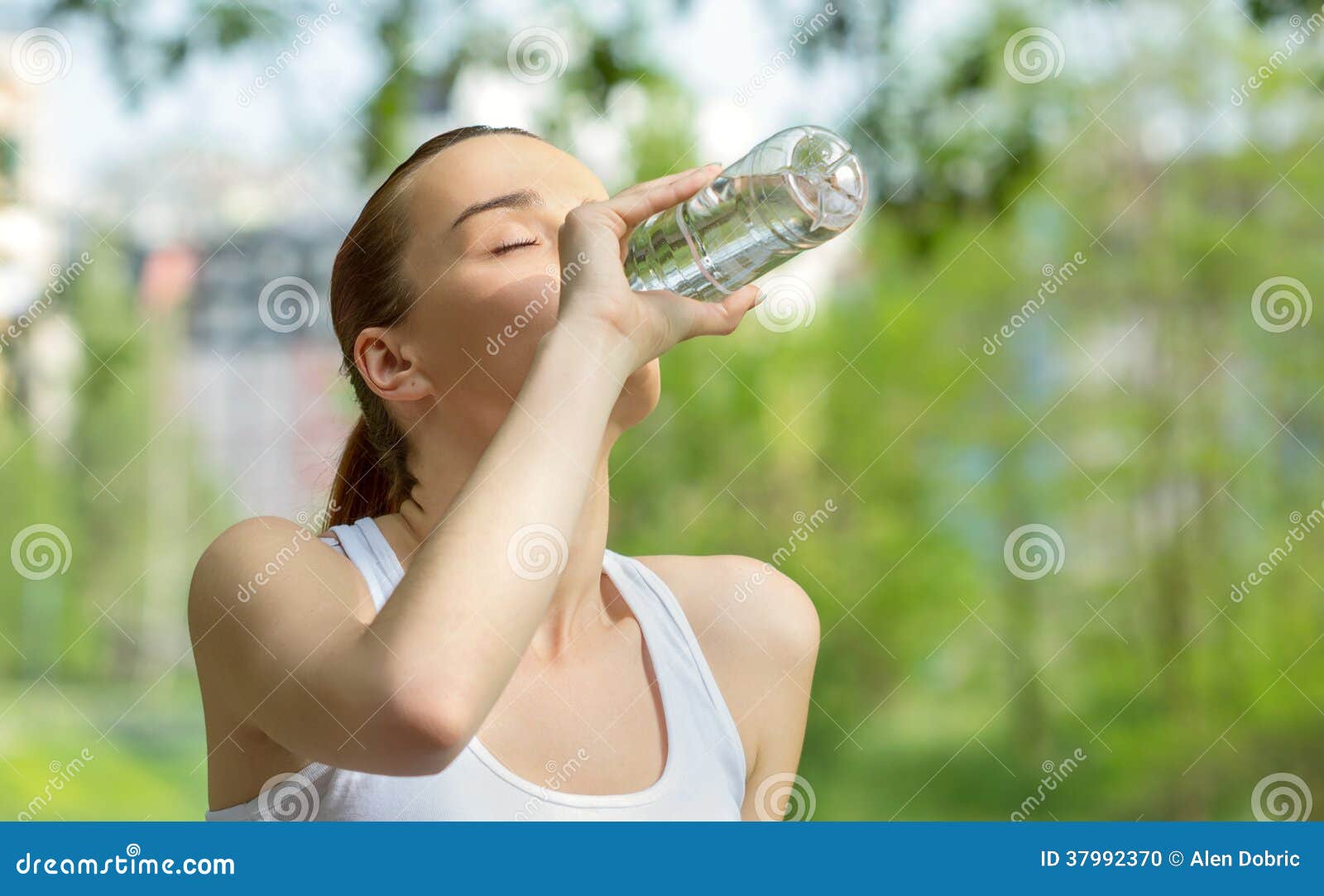 young vitality woman drinking water