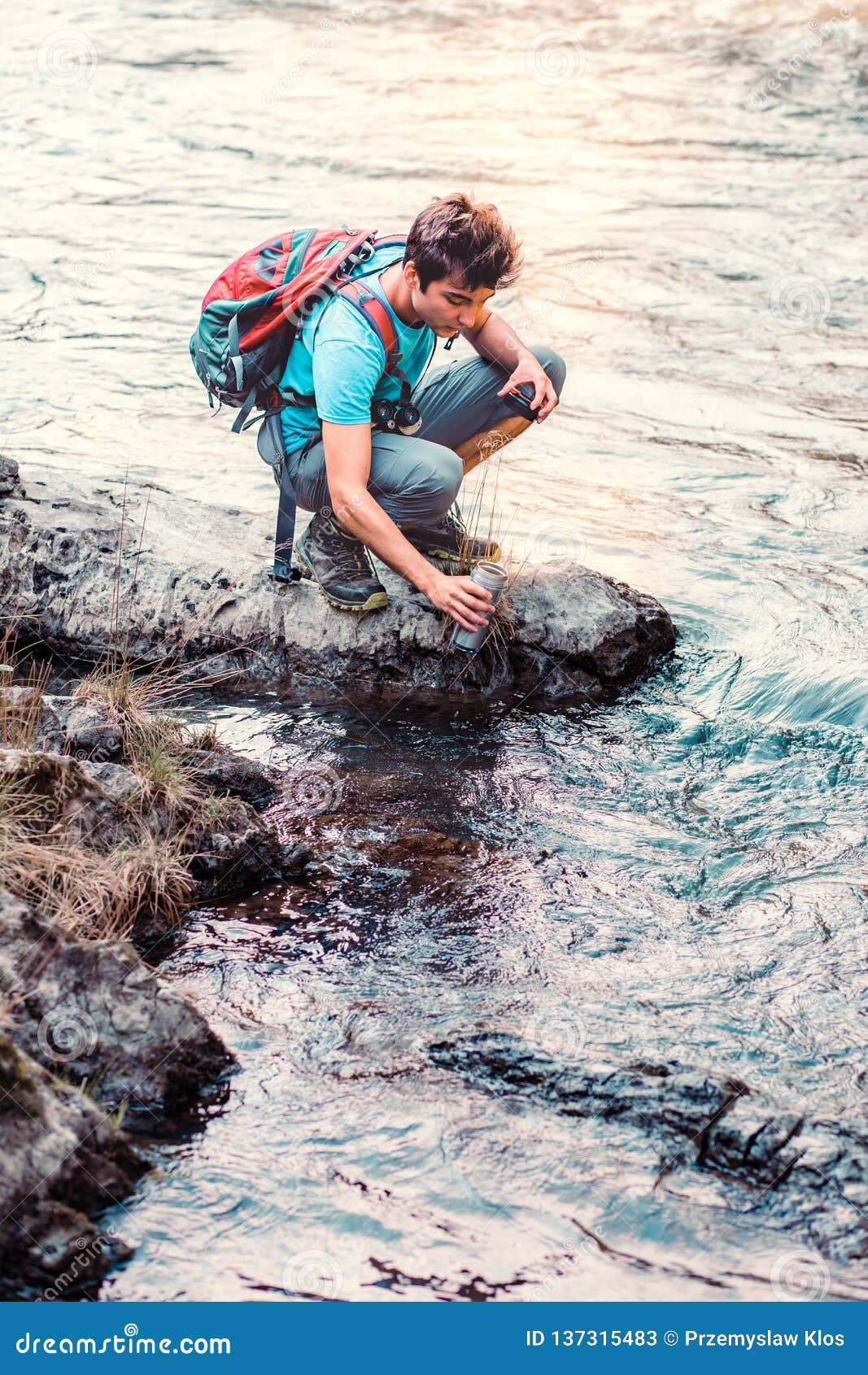 Young Wanderer Takes Pure Water from a River Stock Image - Image of ...