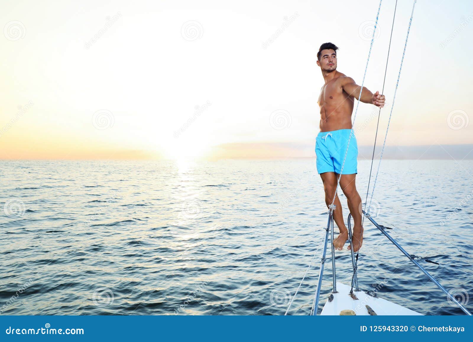 white man on yacht