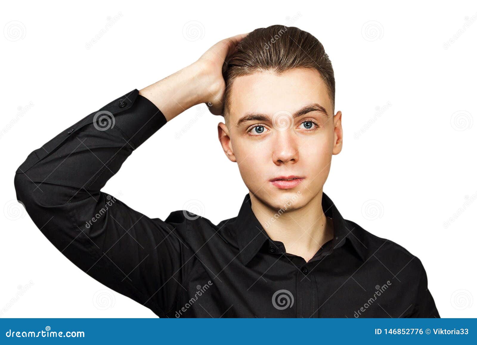 Young White Guy With A Pompadour Hairstyle Dressed In Black Shirt
