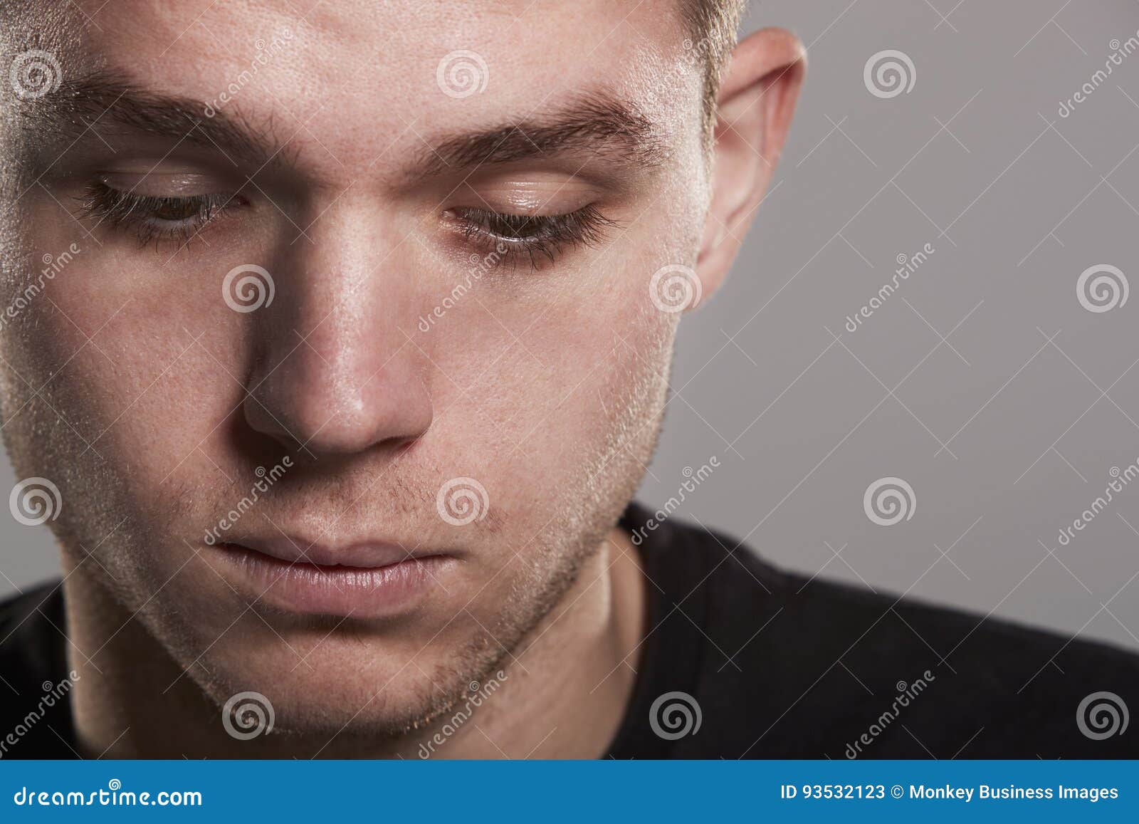 Young White Man Looking Down, Close Up Stock Image - Image of front ...