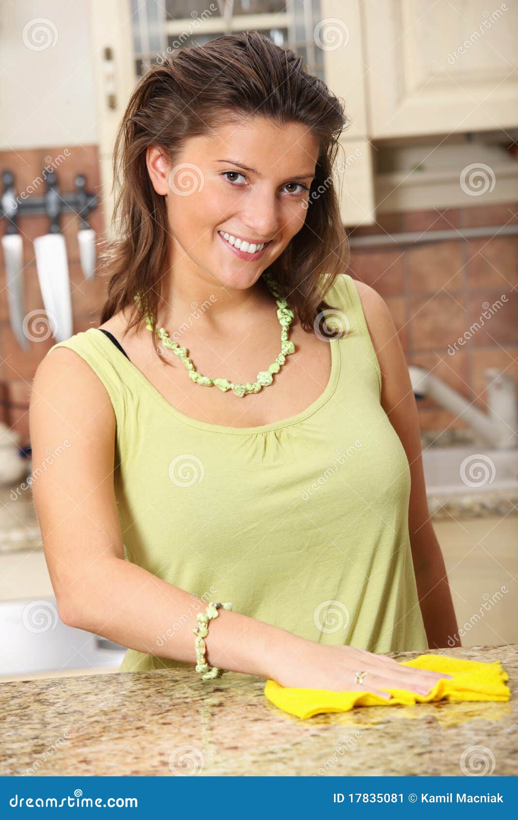 Young Wife Cleaning the Kitchen Stock Image - Image of surface, working