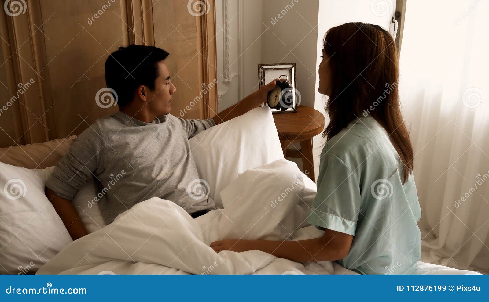 Young Wife Woke Her Husband To Wake Up When Late Stock Image Im